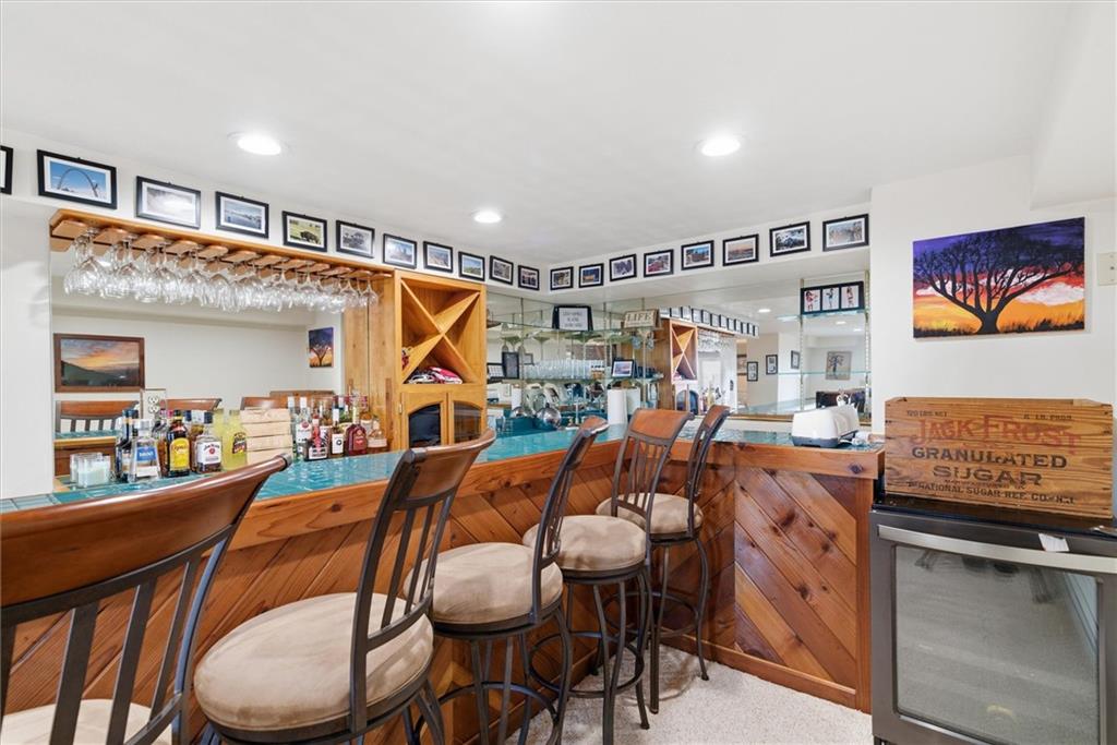 128 Tower Street Monongahela, PA 15063 - Photo 44 of 50 a living room with furniture a rug and a wall painting