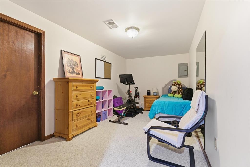 128 Tower Street Monongahela, PA 15063 - Photo 45 of 50 a view of a workspace with furniture and gym equipment