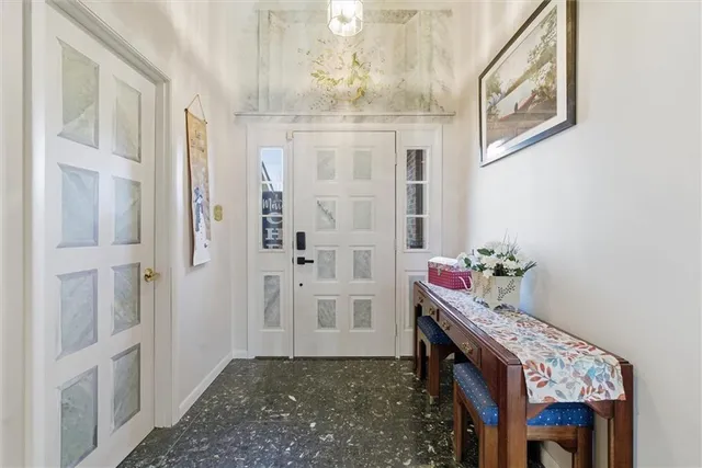 a bathroom with a sink a vanity and a mirror