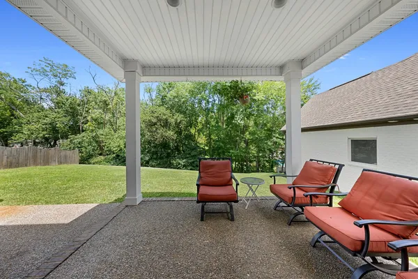 a outdoor living space with furniture and garden view