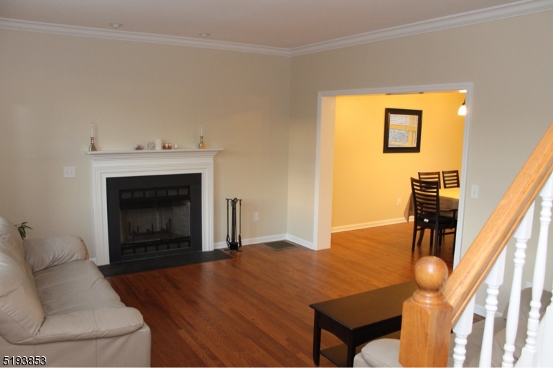 58 Main Street Peapack-Gladstone, NJ 07977 - Photo 4 of 6 a living room with furniture and a fireplace