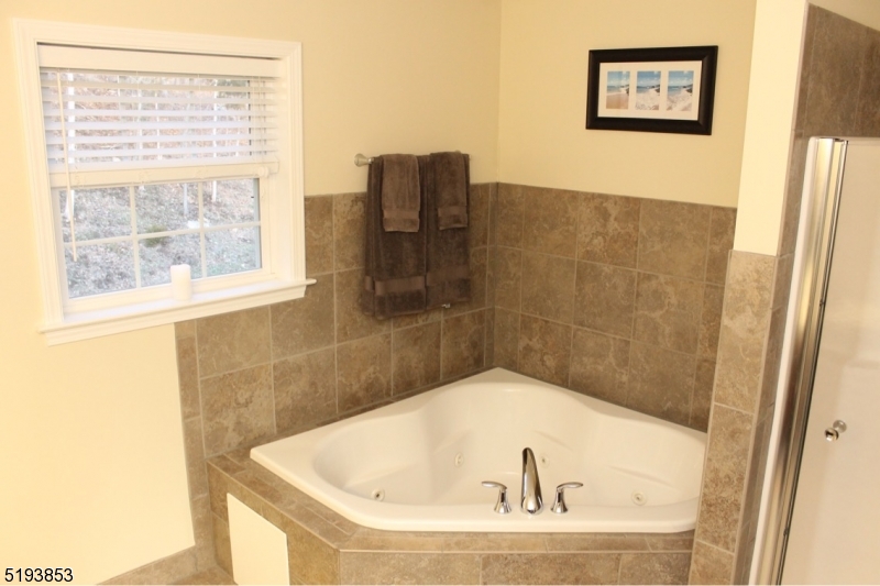 58 Main Street Peapack-Gladstone, NJ 07977 - Photo 6 of 6 a bathroom with a bathtub