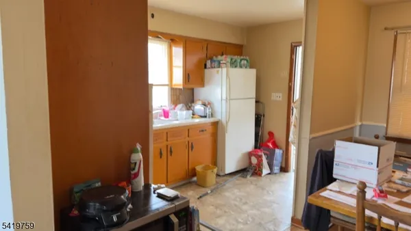 a bedroom with a workspace