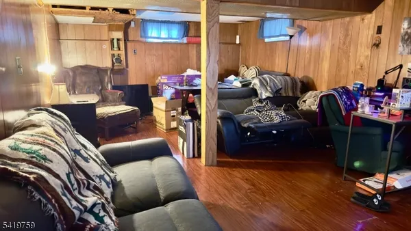 a view of a livingroom with furniture and a couch