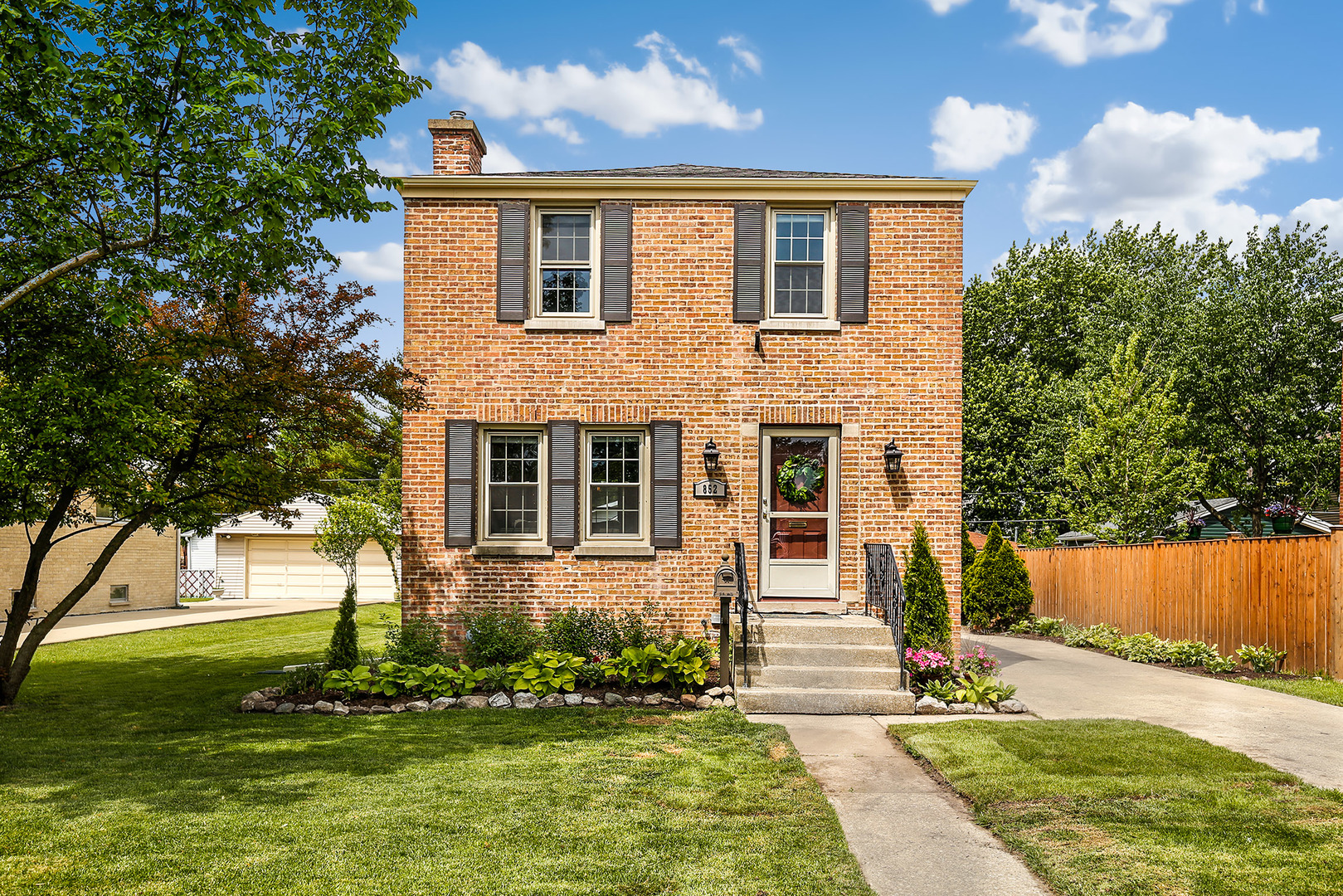 852 Spring Road Elmhurst, IL 60126 - Photo 1 of 24 front view of a house with a yard
