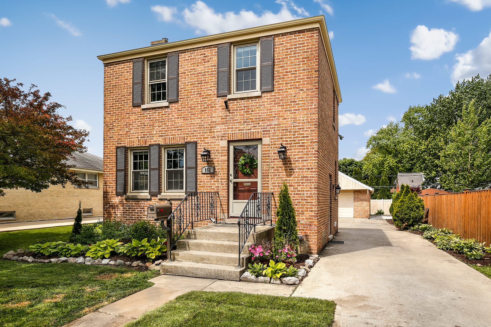 852 Spring Road Elmhurst, IL 60126 - Photo 24 of 24 a front view of a house with a yard
