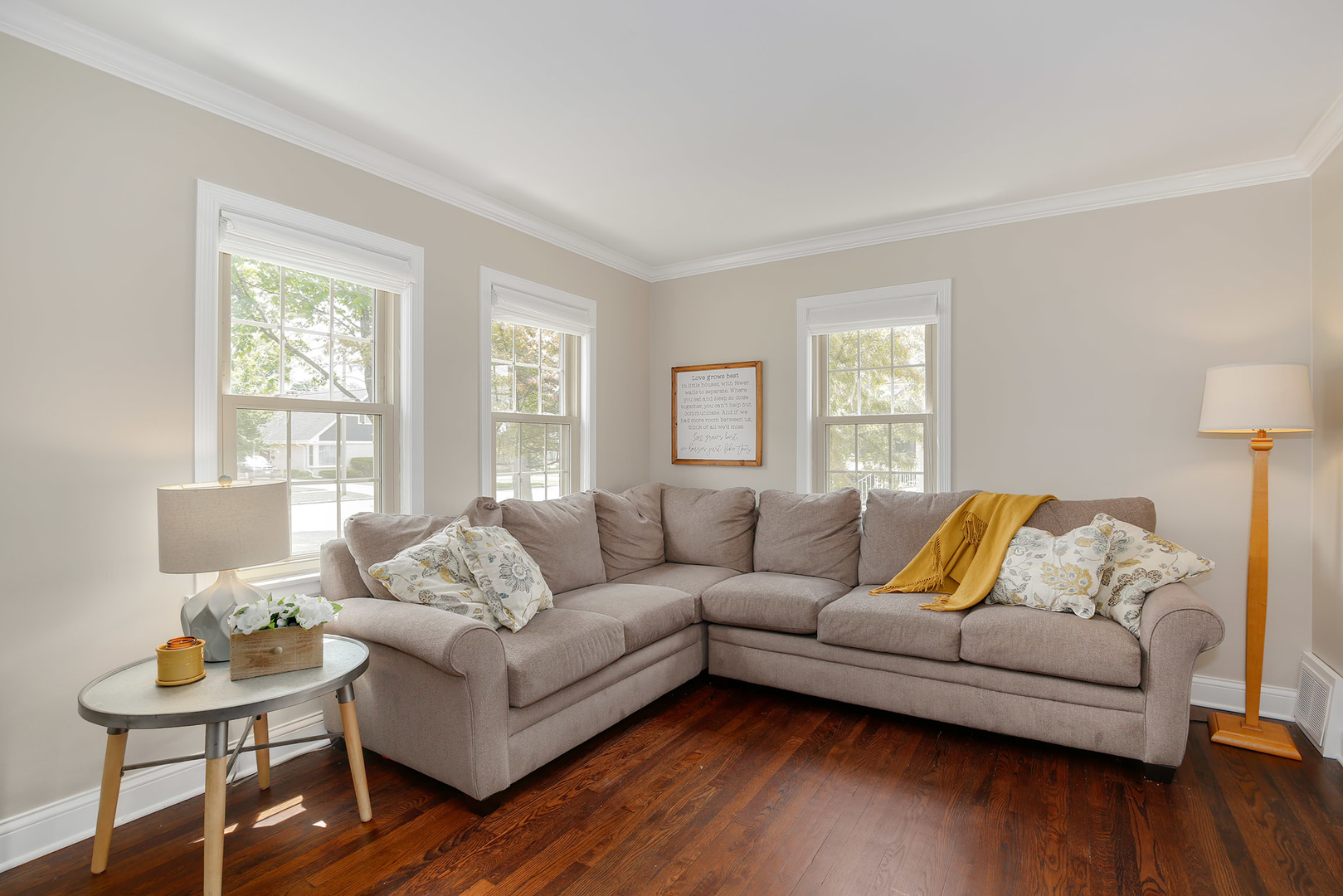 852 Spring Road Elmhurst, IL 60126 - Photo 3 of 24 a living room with furniture and wooden floor