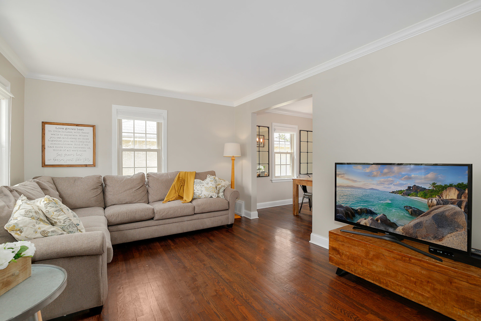 852 Spring Road Elmhurst, IL 60126 - Photo 4 of 24 a living room with furniture and a flat screen tv
