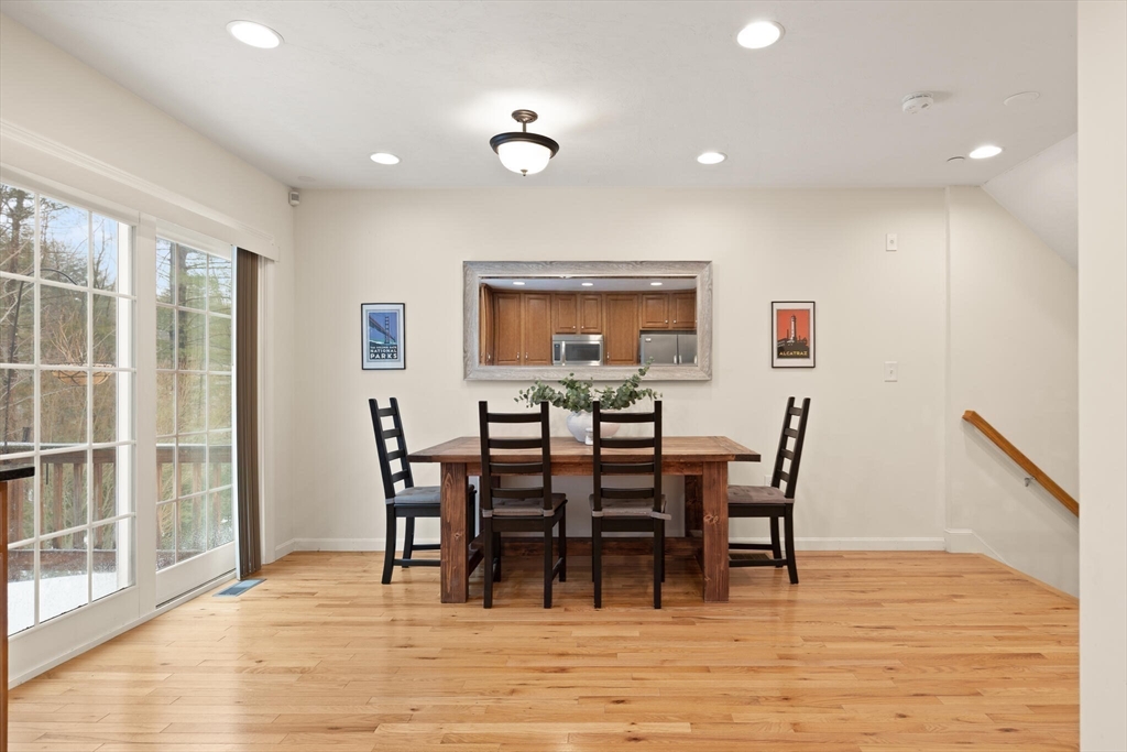 41 Boston Road, Unit 485 Billerica, MA 01862 - Photo 5 of 19 a view of a dining room with furniture