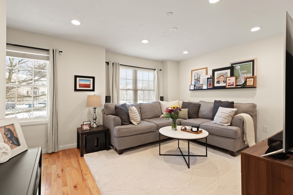 41 Boston Road, Unit 485 Billerica, MA 01862 - Photo 10 of 19 a living room with furniture a rug and a window