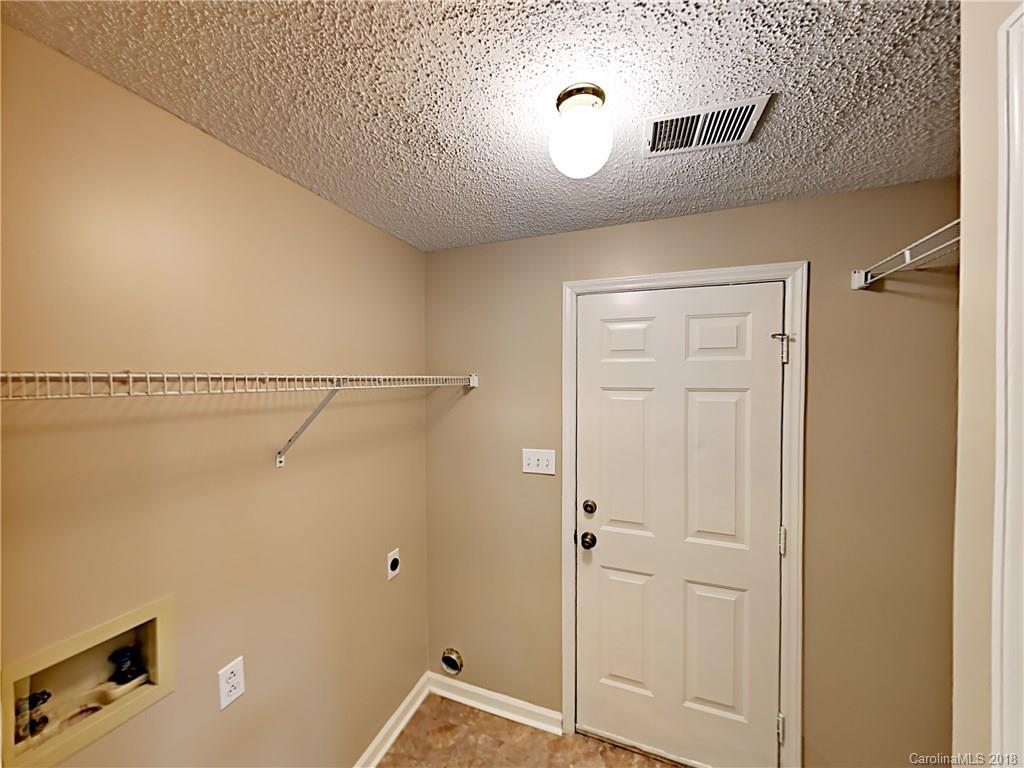 7315 Reedy Creek Road Charlotte, NC 28215 - Photo 9 of 18 a bathroom with a shower