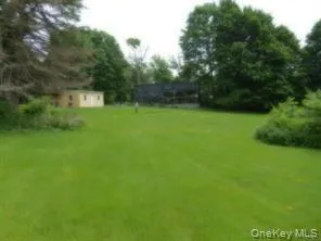 a view of a field of a house