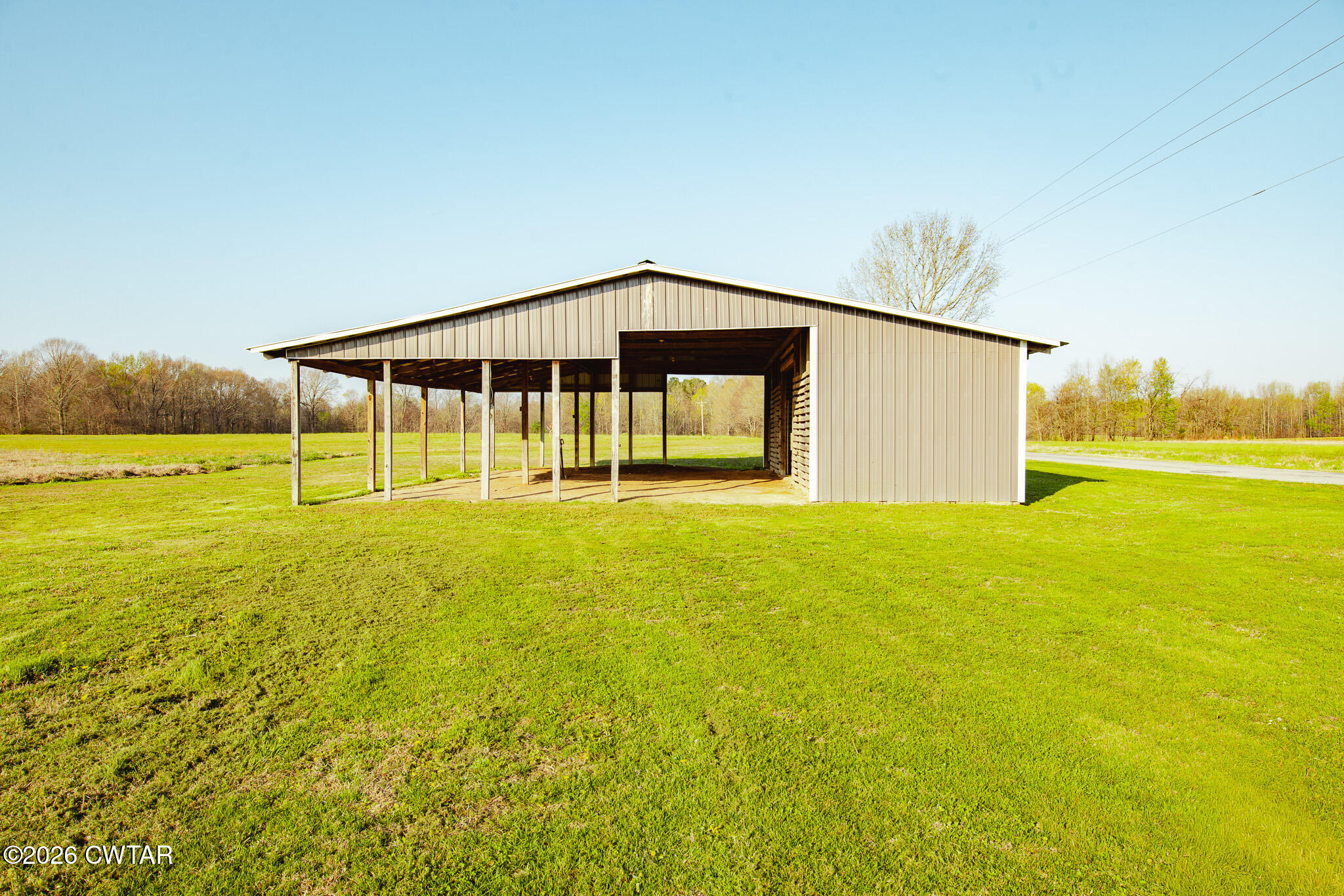 0 Boydsville Road Palmersville, TN 38241 - Photo 15 of 25 a big house with swimming pool in front of it