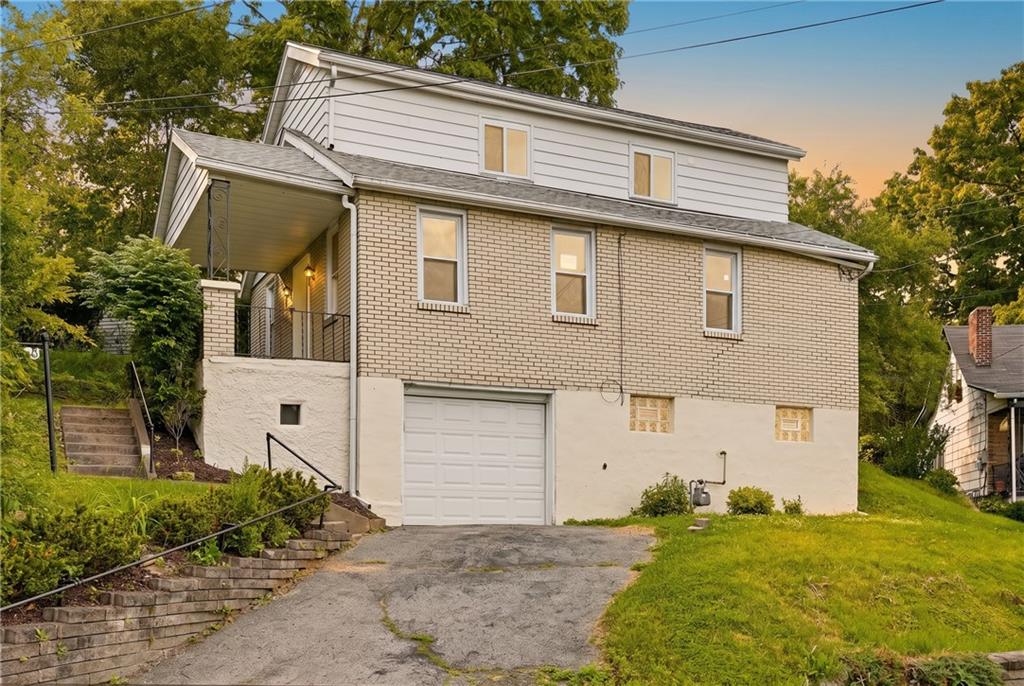 480 Songo Street Pittsburgh, PA 15227 - Photo 2 of 36 a front view of a house with a yard