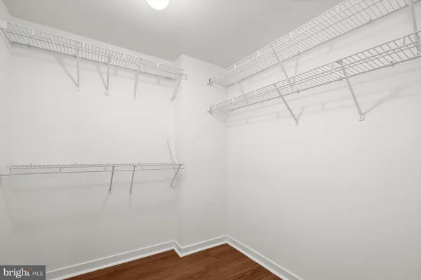 a view of a room with racks on the wall