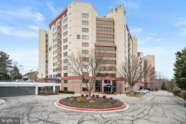 a building with trees in front of it