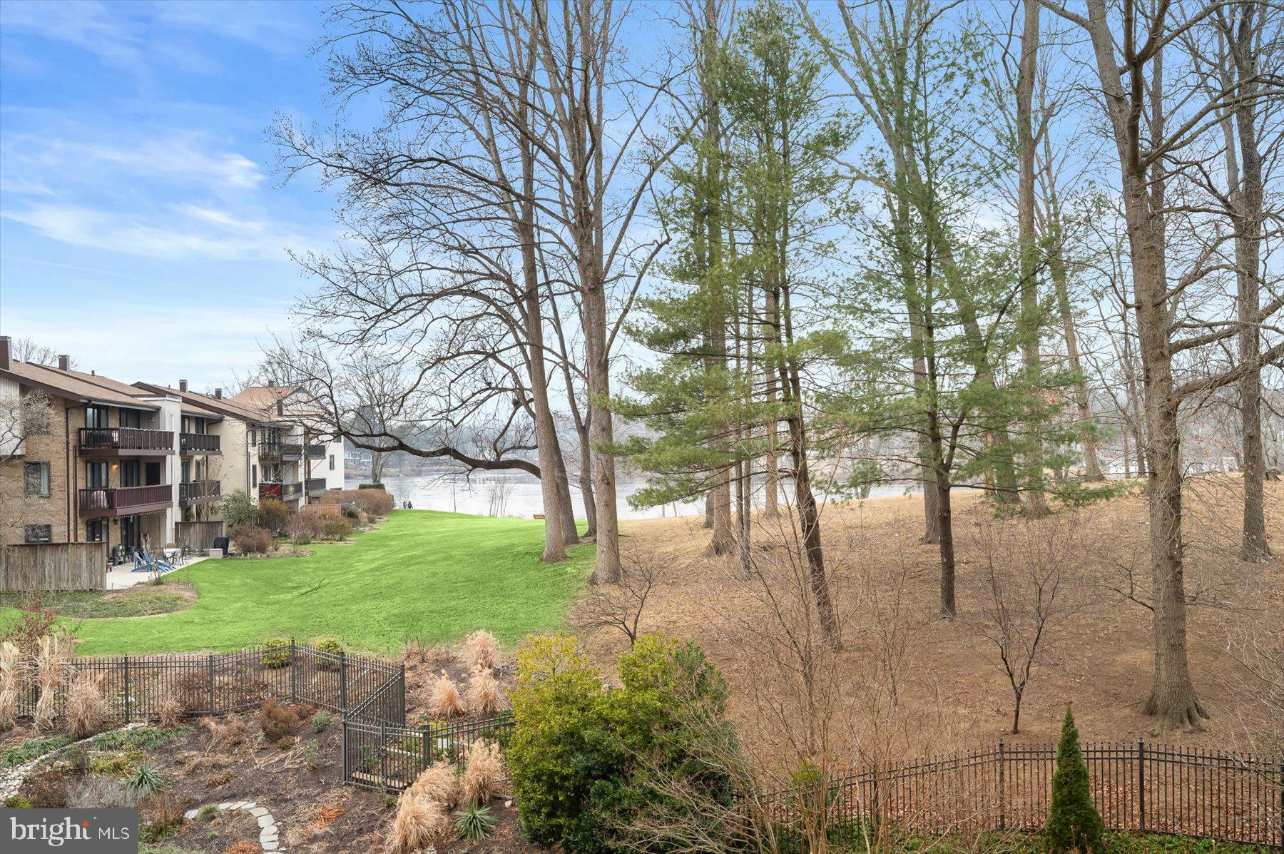 10001 Windstream Drive, Unit 404 Columbia, MD 21044 - Photo 45 of 51 a backyard of a house with lots of green space