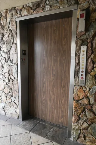 a view of a swimming pool with a lounge chairs