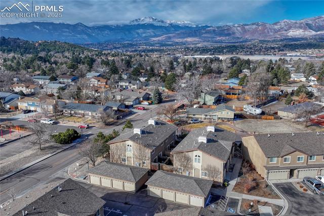 1502 York Road, Unit 102 Colorado Springs, CO 80920 - Photo 28 of 29 Aerial view with a mountain view and a residential view