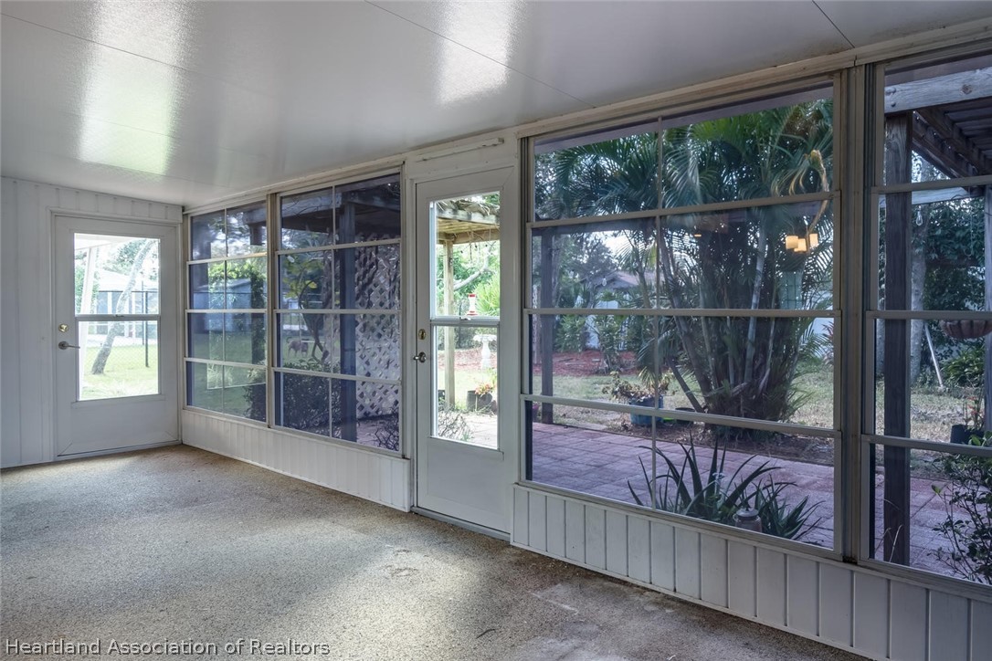 4115 Loquat Road Sebring, FL 33875 - Photo 14 of 28 a view of a room with a large window