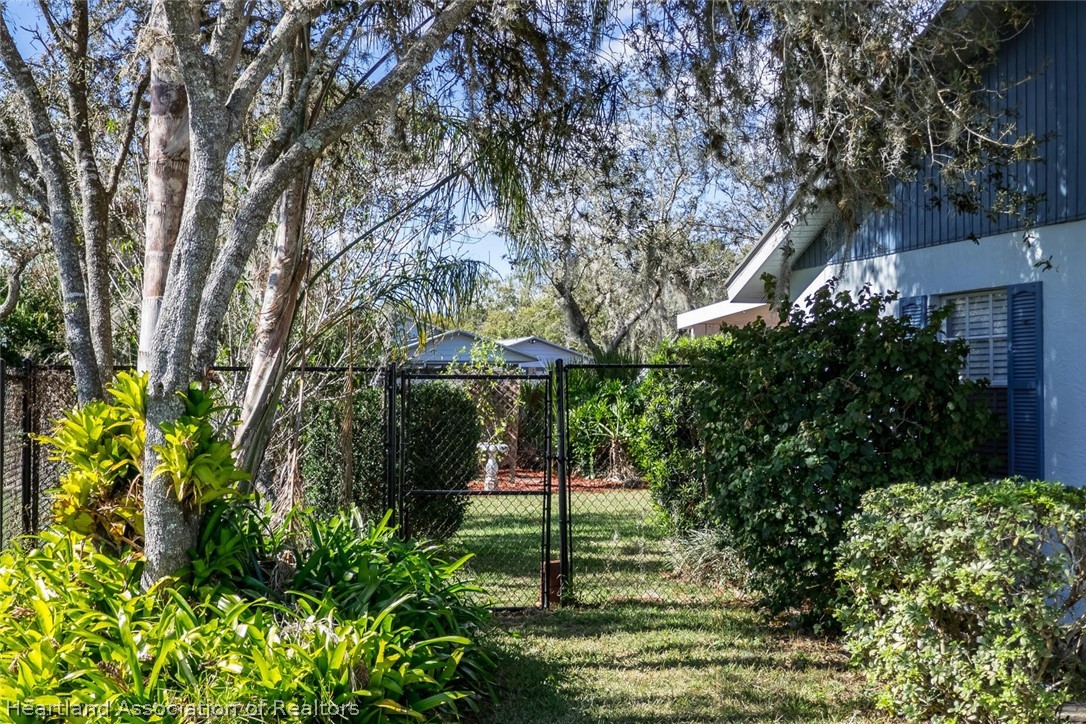 4115 Loquat Road Sebring, FL 33875 - Photo 24 of 28 a view of a park that has large trees