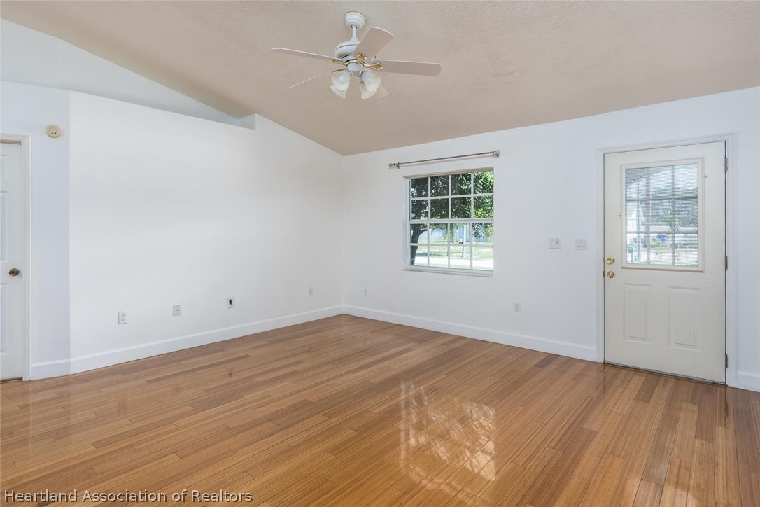 4115 Loquat Road Sebring, FL 33875 - Photo 5 of 28 a view of an empty room with a window