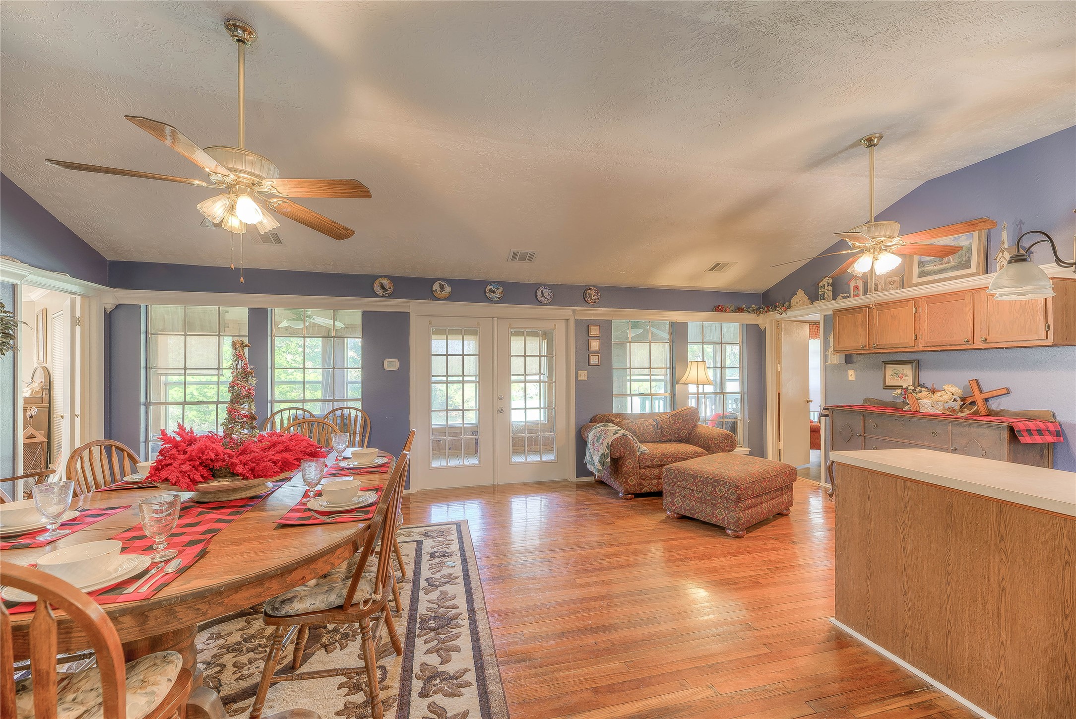 300 L Green Road Cleveland, TX 77328 - Photo 16 of 44 a living room with furniture and large windows