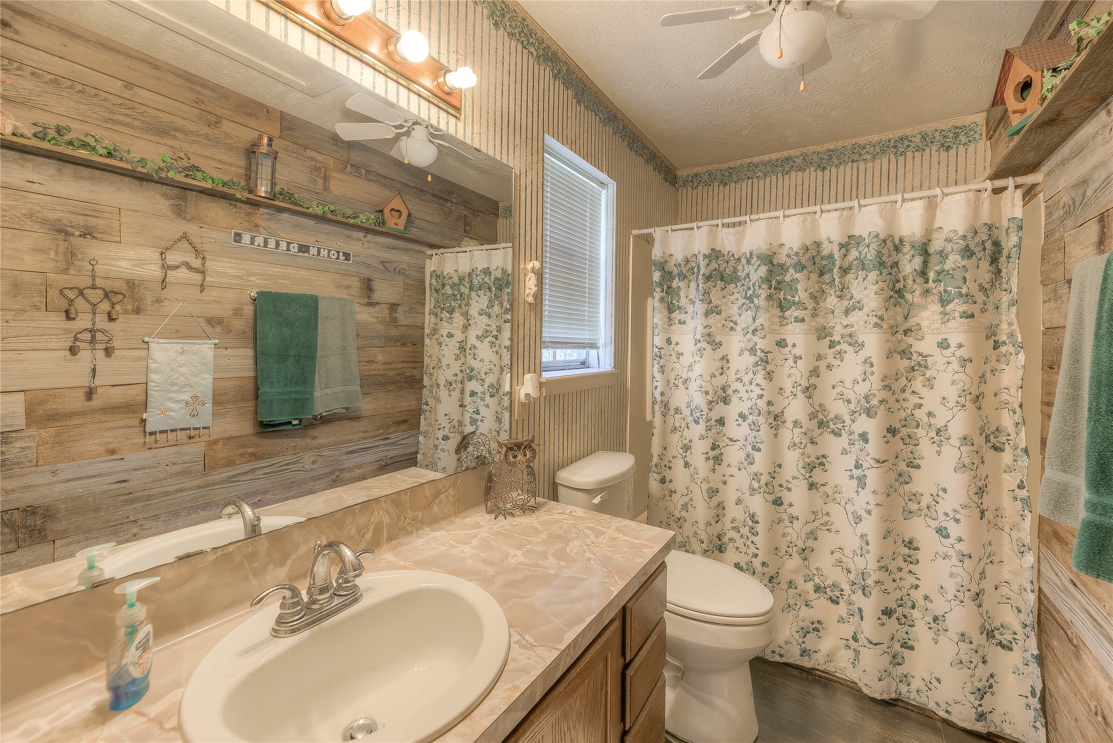300 L Green Road Cleveland, TX 77328 - Photo 20 of 44 a bathroom with a sink and a mirror