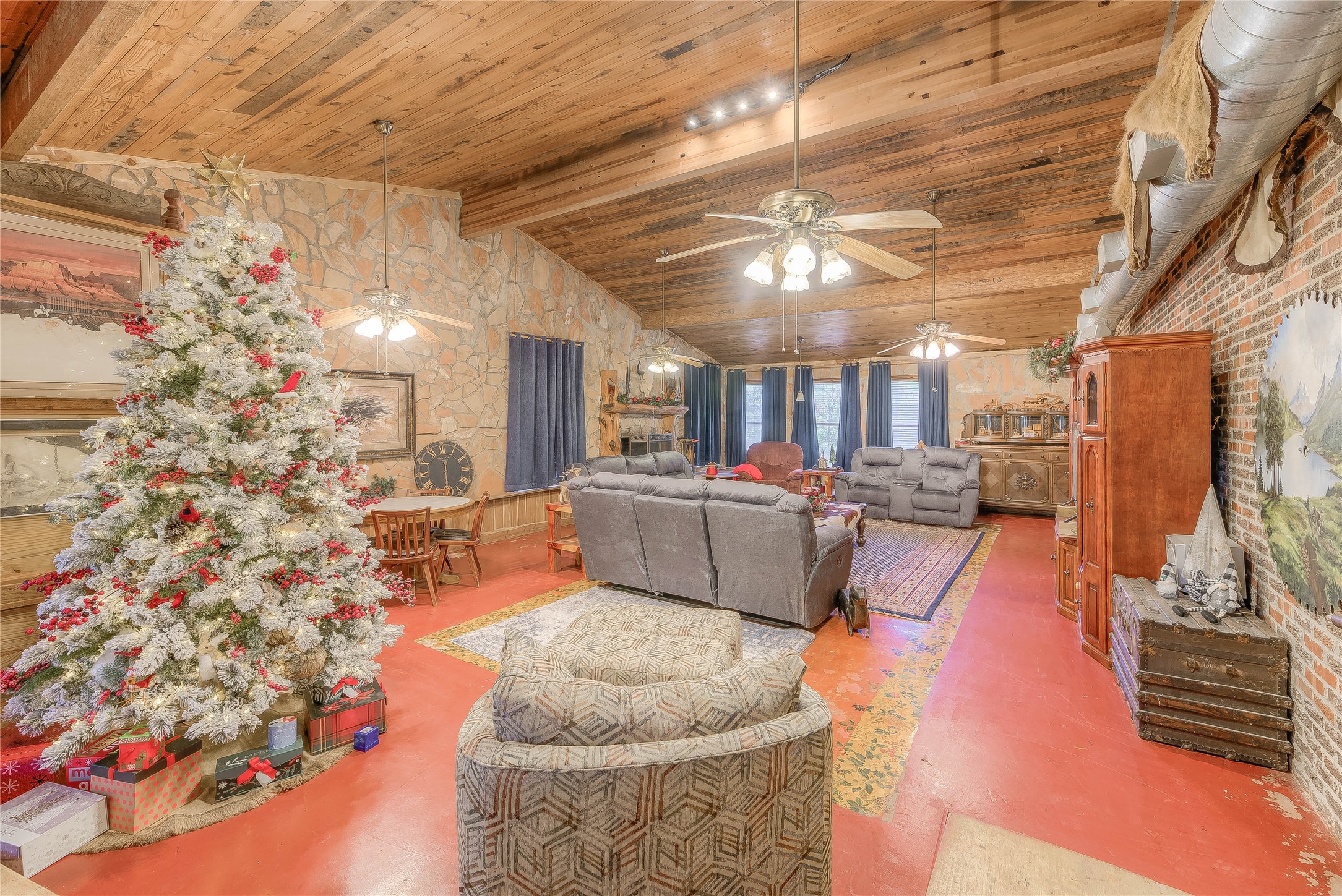 300 L Green Road Cleveland, TX 77328 - Photo 2 of 44 a living room with furniture and a chandelier