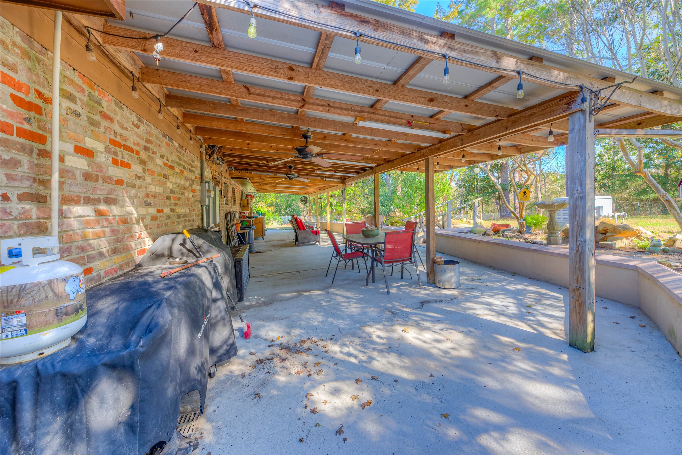 300 L Green Road Cleveland, TX 77328 - Photo 24 of 44 a view of a big room with wooden walls