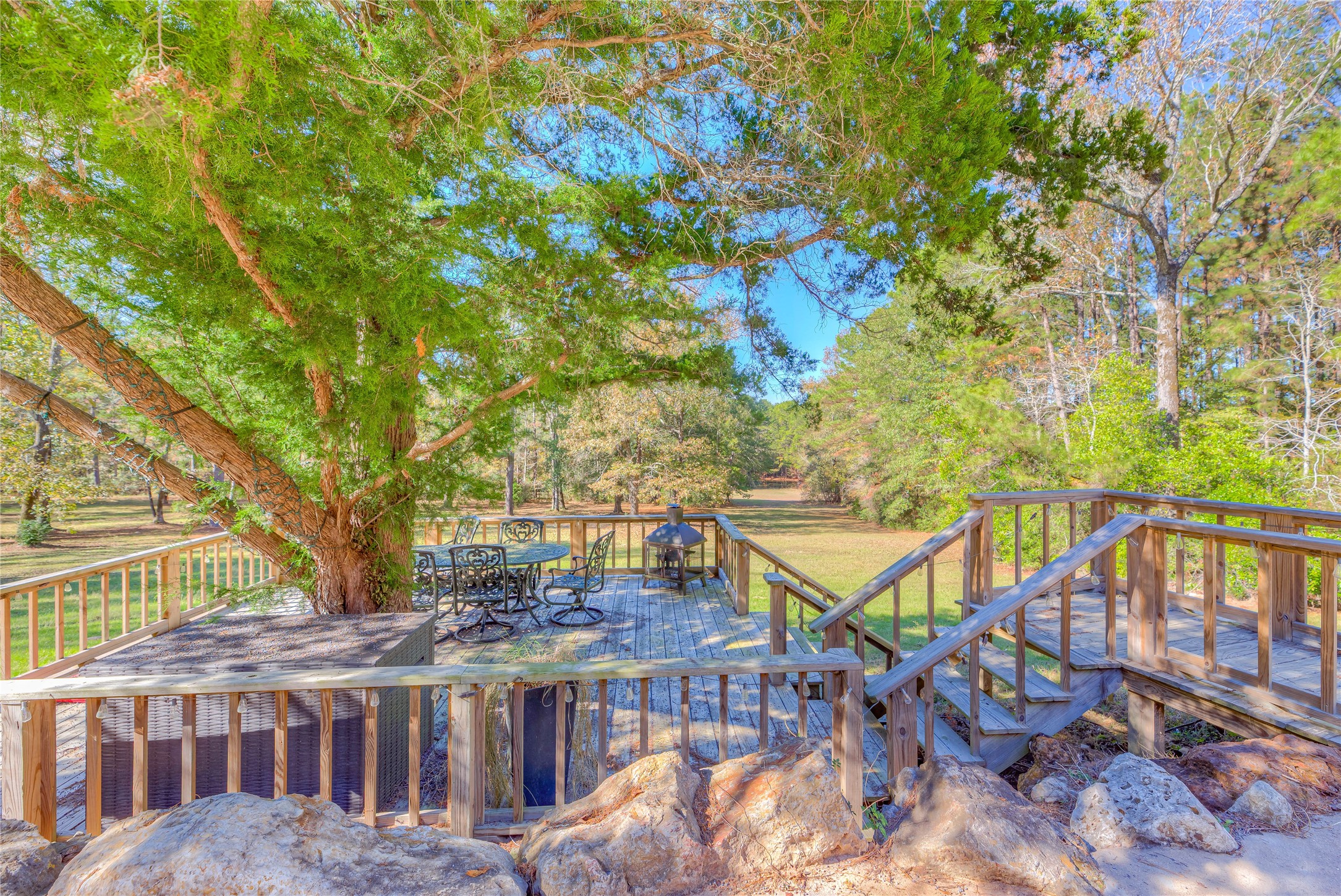 300 L Green Road Cleveland, TX 77328 - Photo 26 of 44 a view of a house with backyard and sitting area