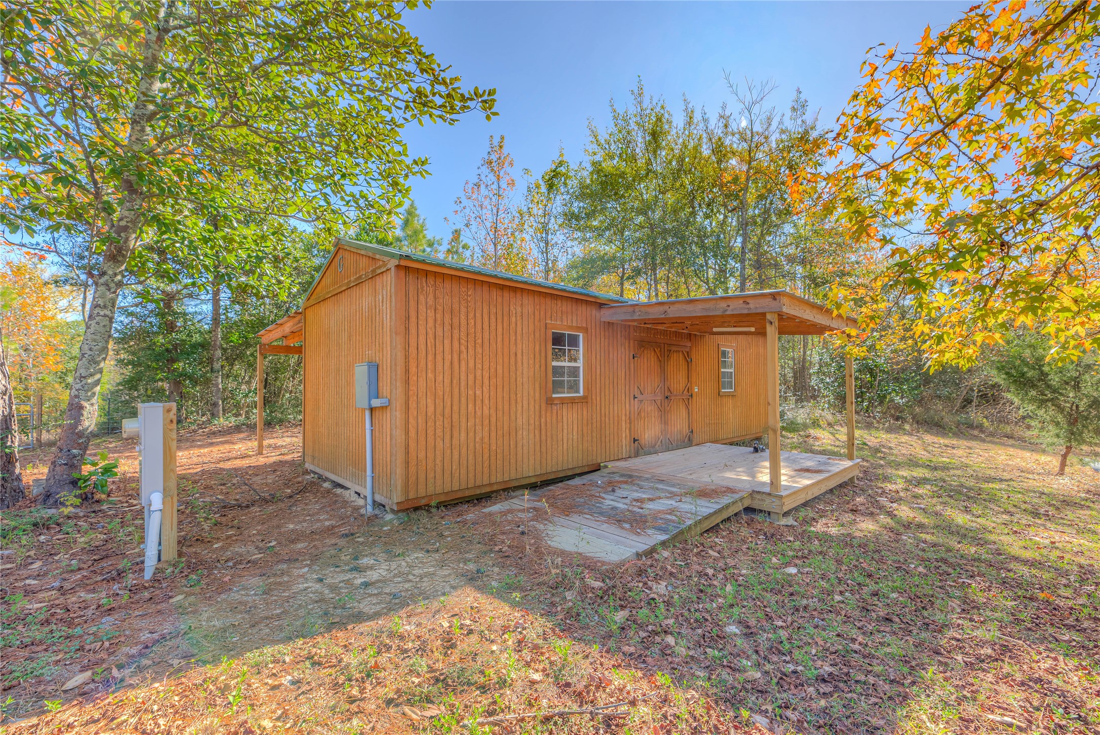 300 L Green Road Cleveland, TX 77328 - Photo 29 of 44 a view of a house with backyard and tree