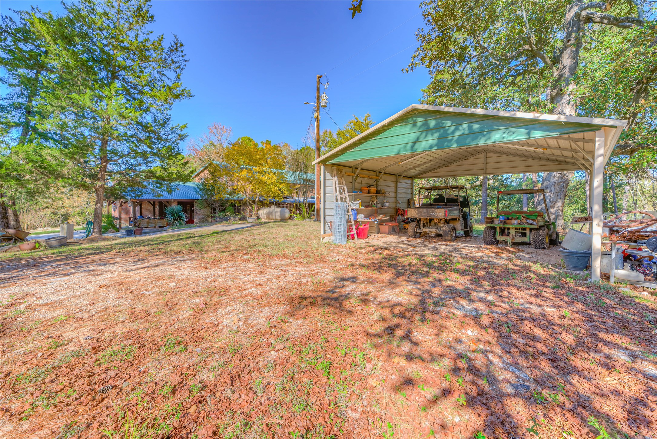 300 L Green Road Cleveland, TX 77328 - Photo 30 of 44 a view of a house with a outdoor space