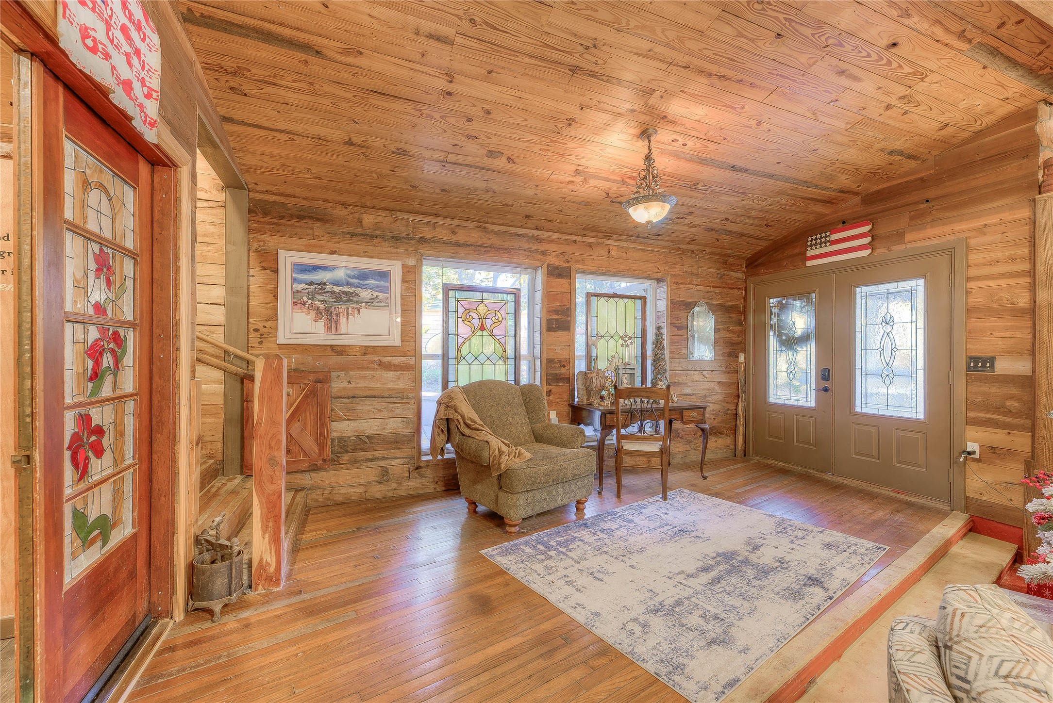 300 L Green Road Cleveland, TX 77328 - Photo 3 of 44 a living room with furniture and wooden floor