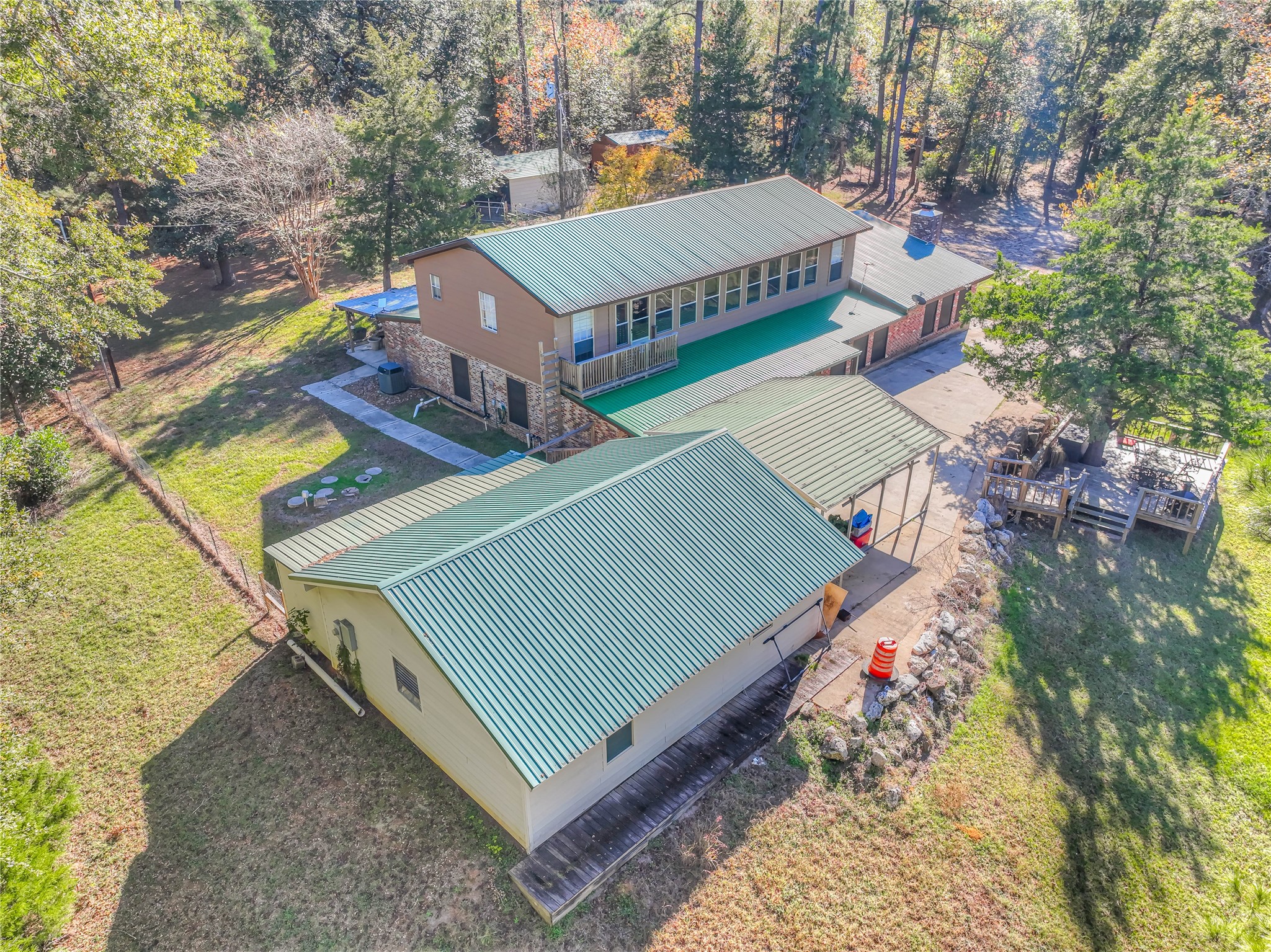 300 L Green Road Cleveland, TX 77328 - Photo 34 of 44 a view of a tennis ground with large trees