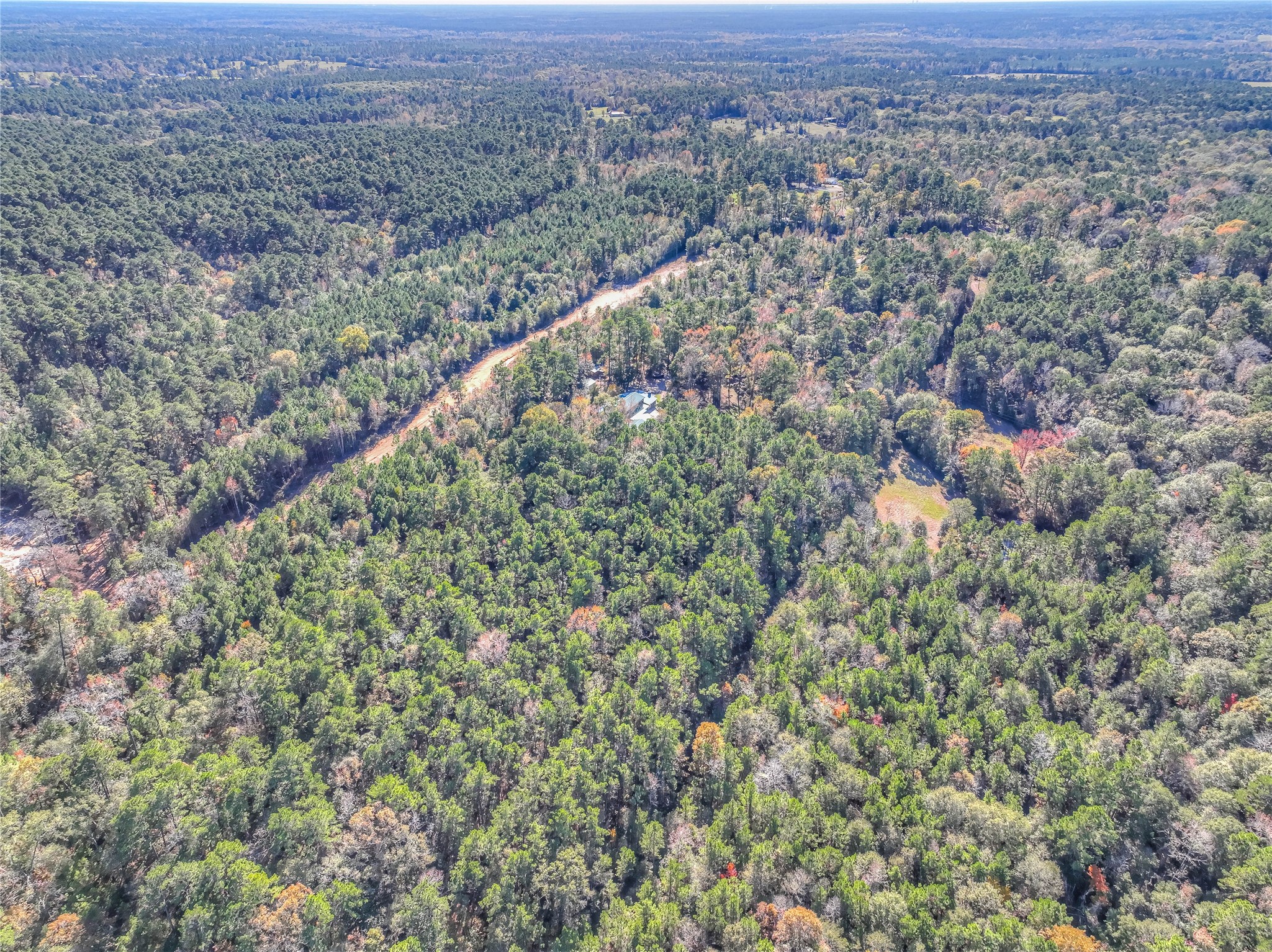 300 L Green Road Cleveland, TX 77328 - Photo 35 of 44 an aerial view of residential houses with outdoor space and trees
