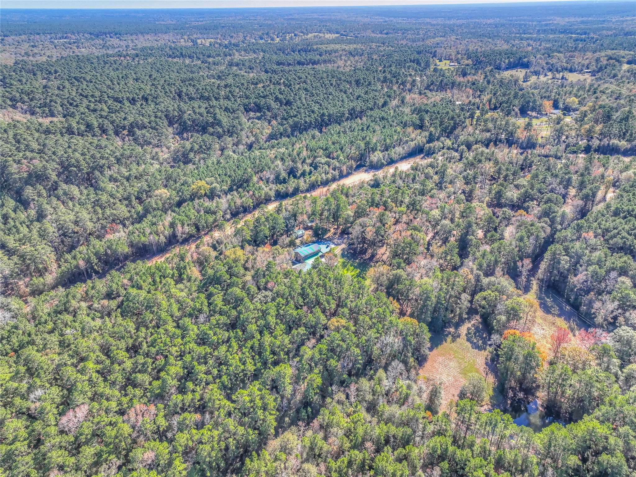 300 L Green Road Cleveland, TX 77328 - Photo 36 of 44 an aerial view of residential house with green space