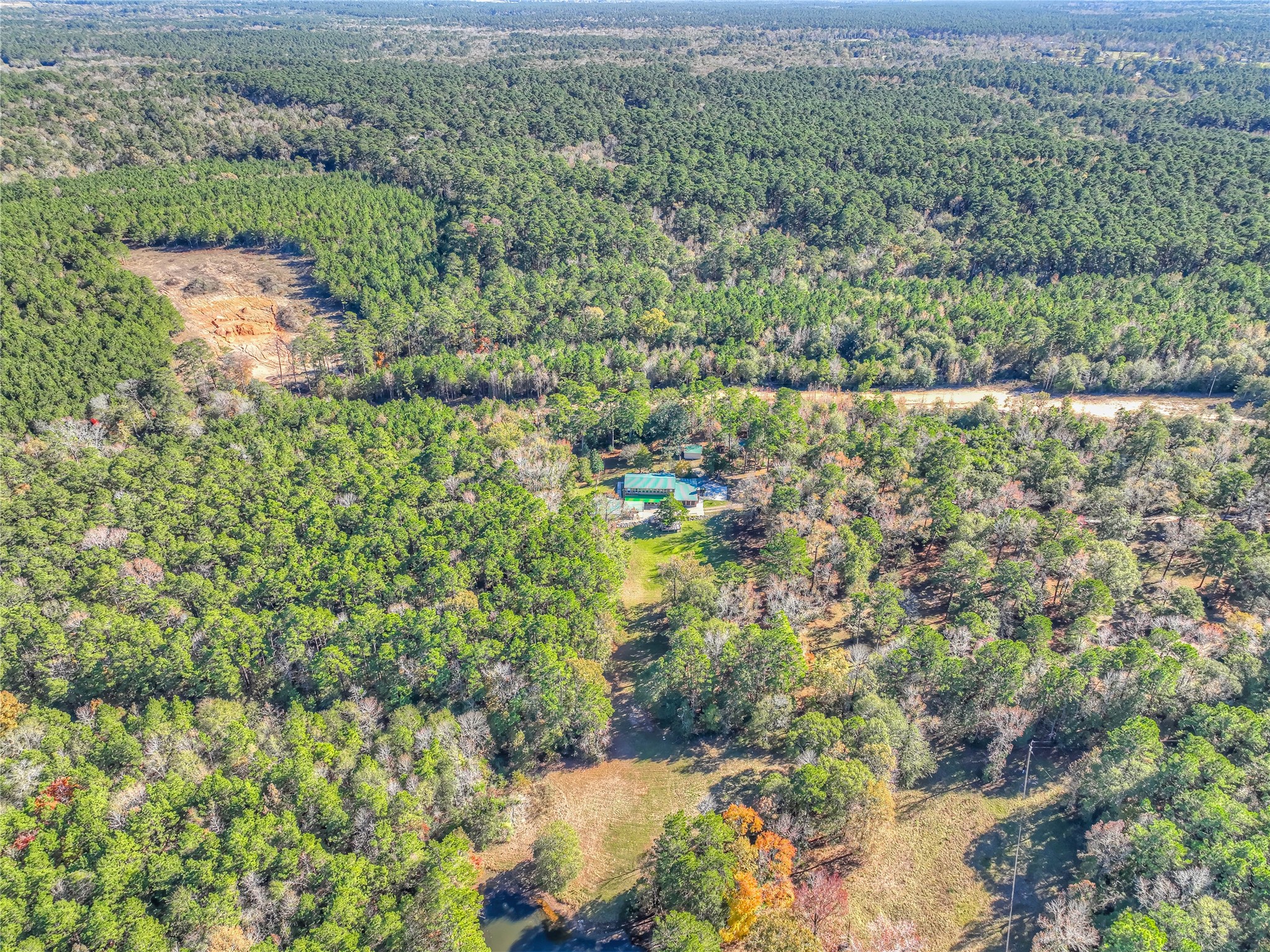300 L Green Road Cleveland, TX 77328 - Photo 37 of 44 an aerial view of residential house with outdoor space