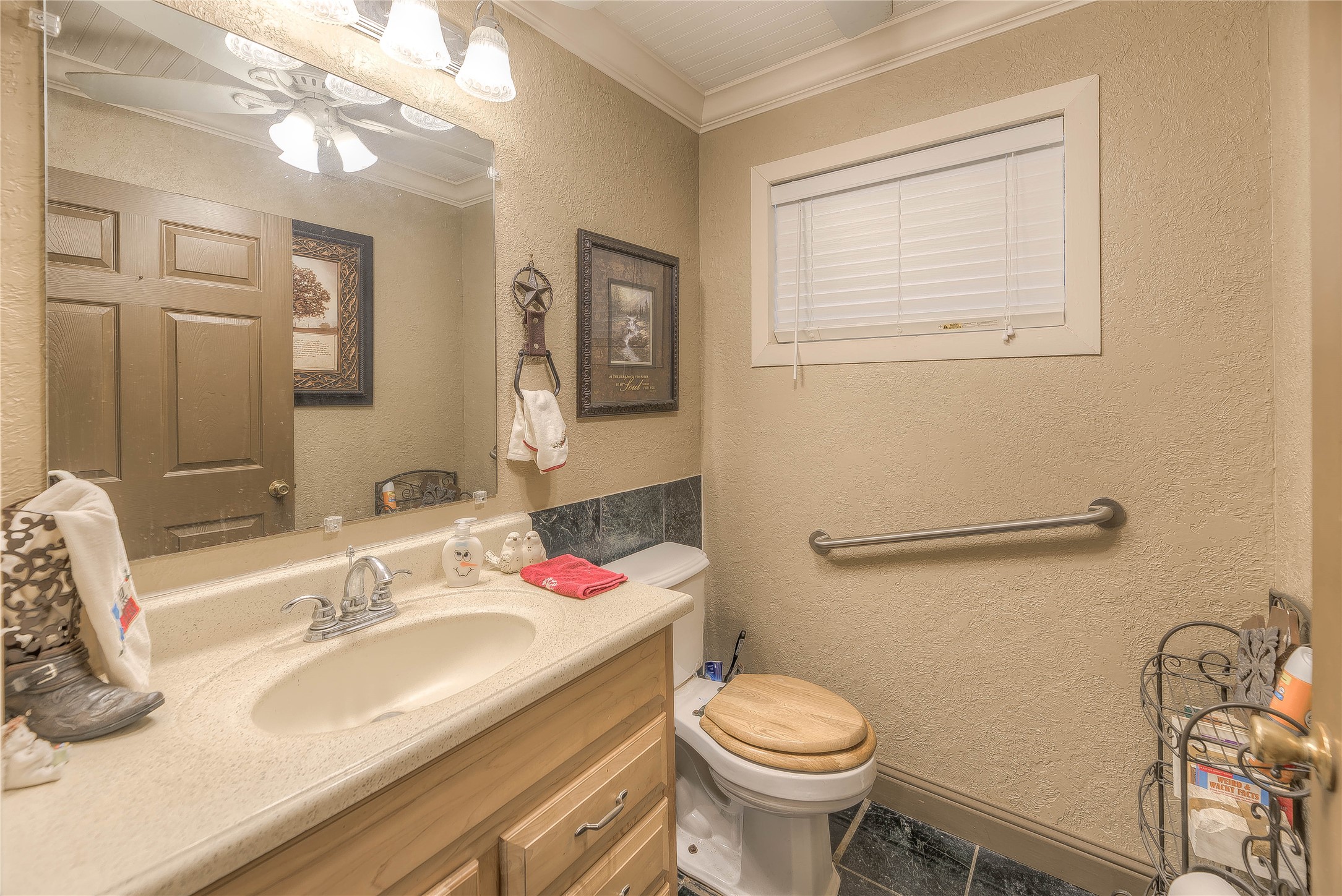 300 L Green Road Cleveland, TX 77328 - Photo 6 of 44 a bathroom with a sink vanity mirror and toilet