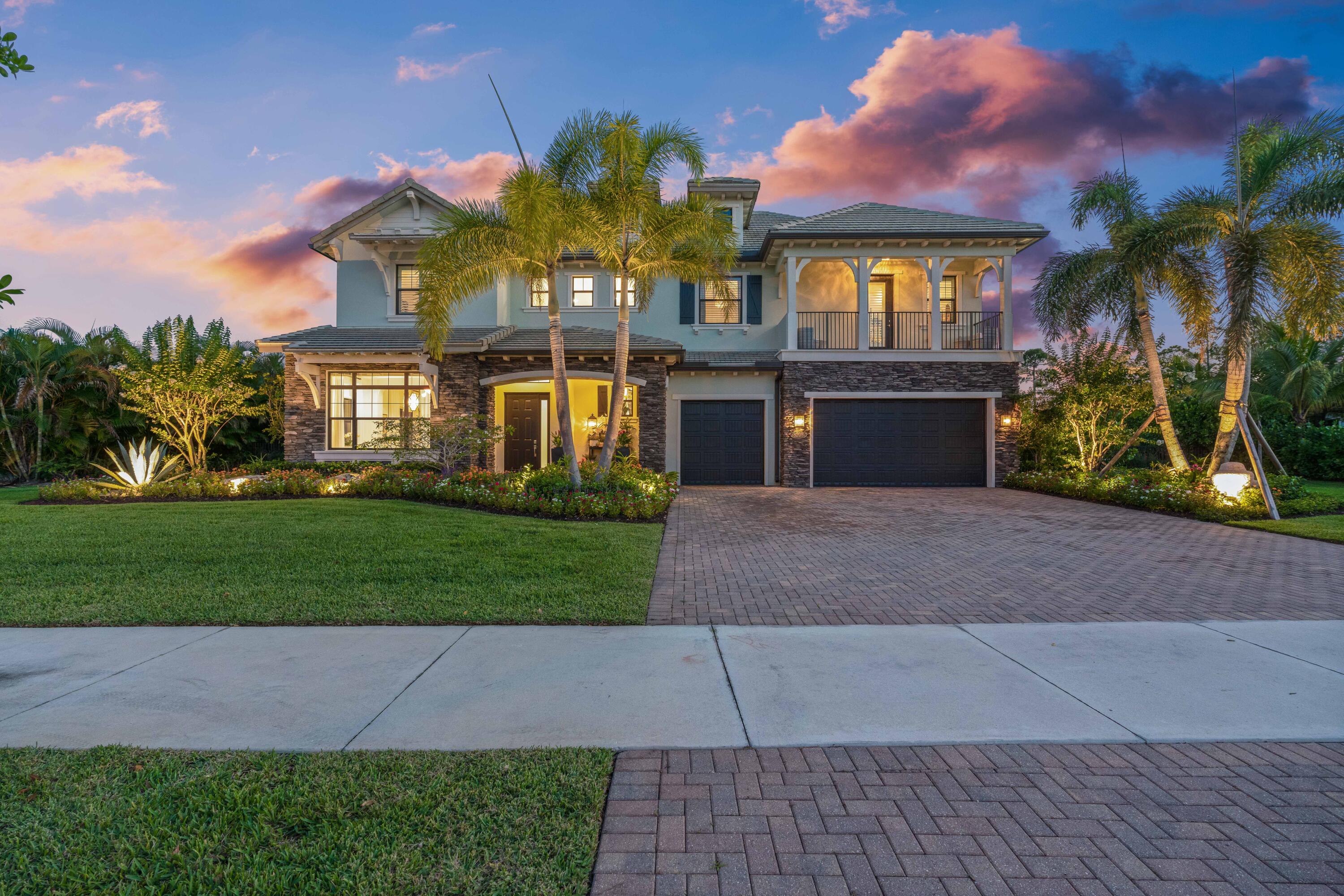 8208 Southeast Red Root Way Jupiter, FL 33458 - Photo 4 of 113 Twilight Front Exterior