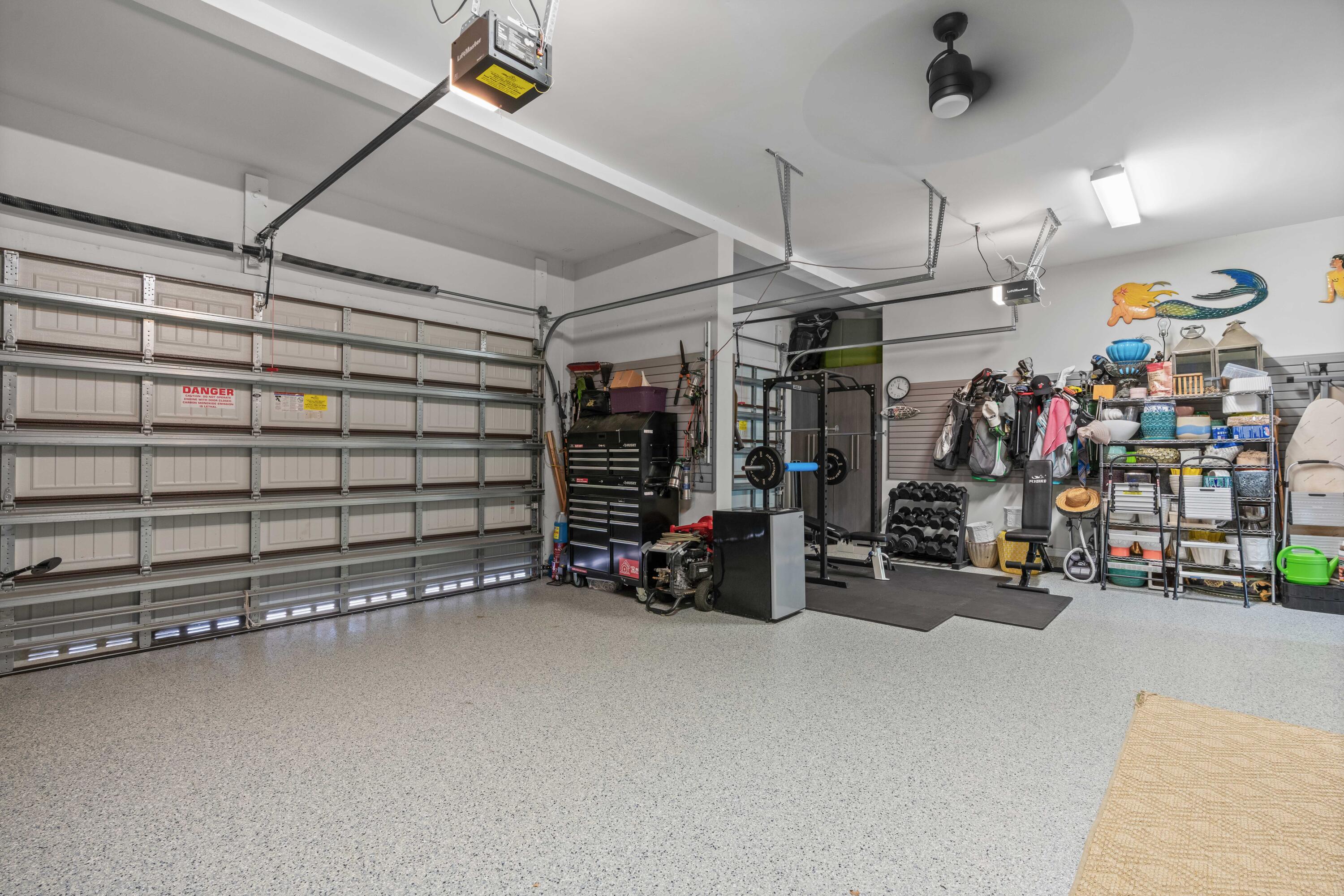 8208 Southeast Red Root Way Jupiter, FL 33458 - Photo 67 of 113 Garage