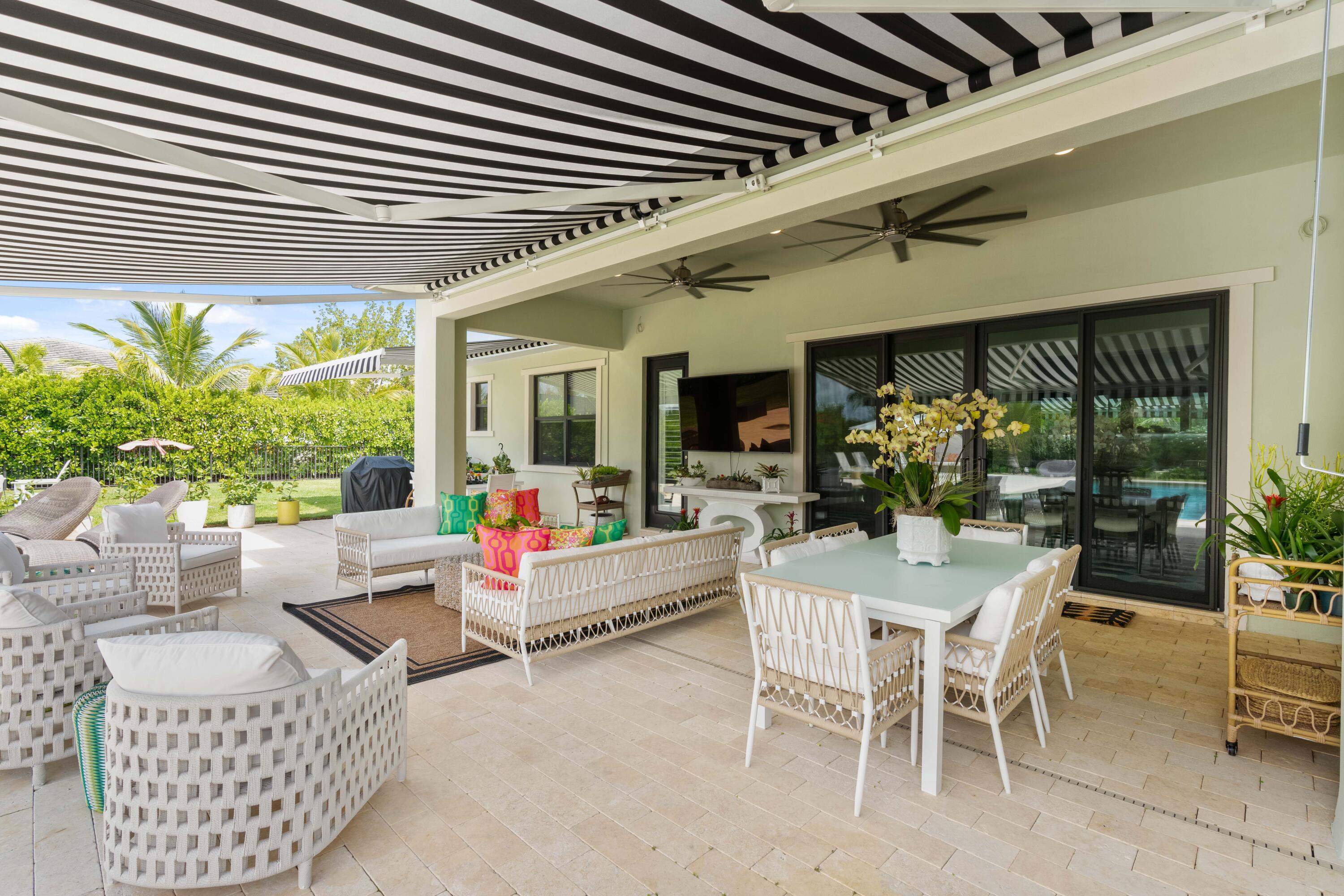 8208 Southeast Red Root Way Jupiter, FL 33458 - Photo 68 of 113 Loggia with Awning