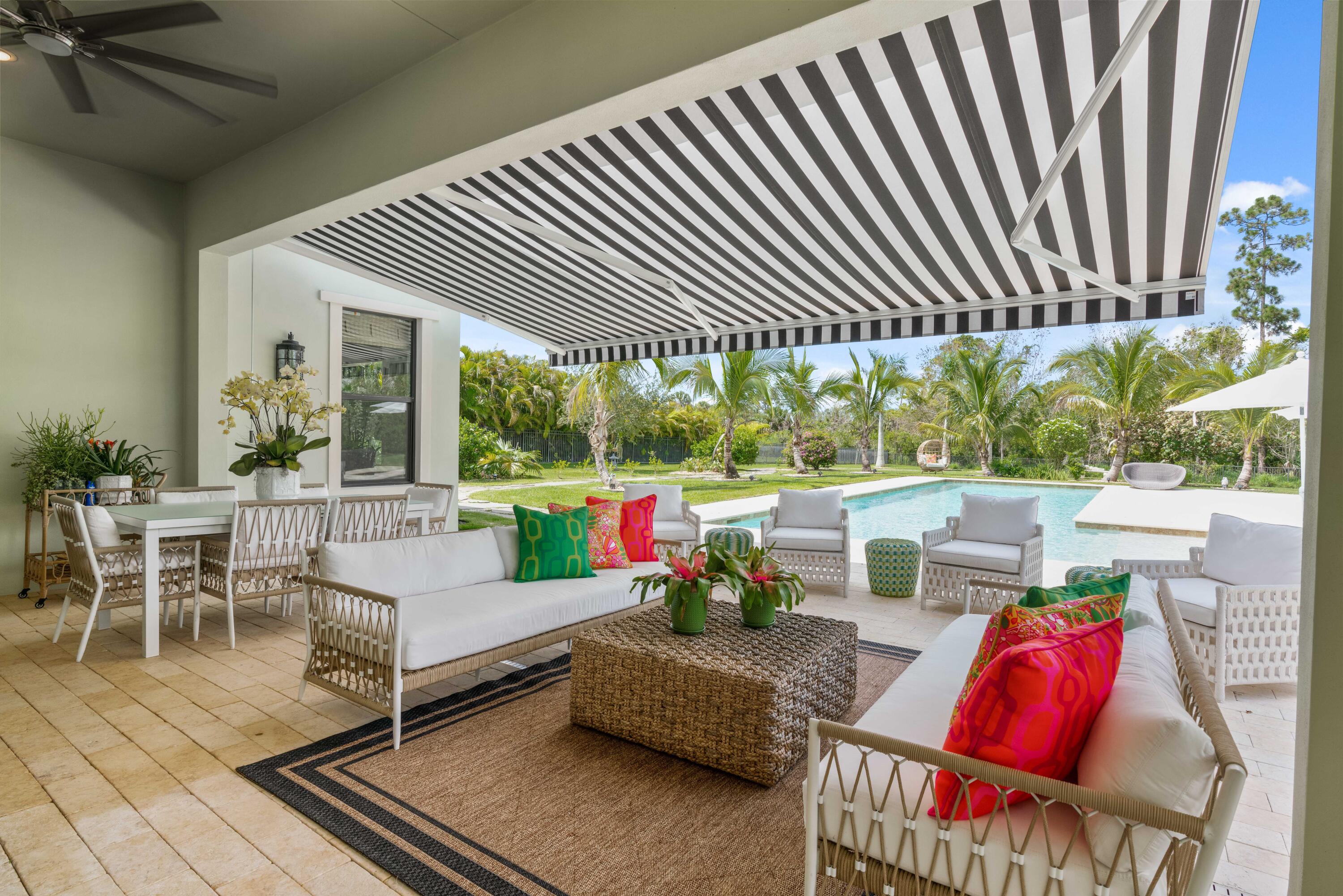 8208 Southeast Red Root Way Jupiter, FL 33458 - Photo 69 of 113 Loggia with Awning