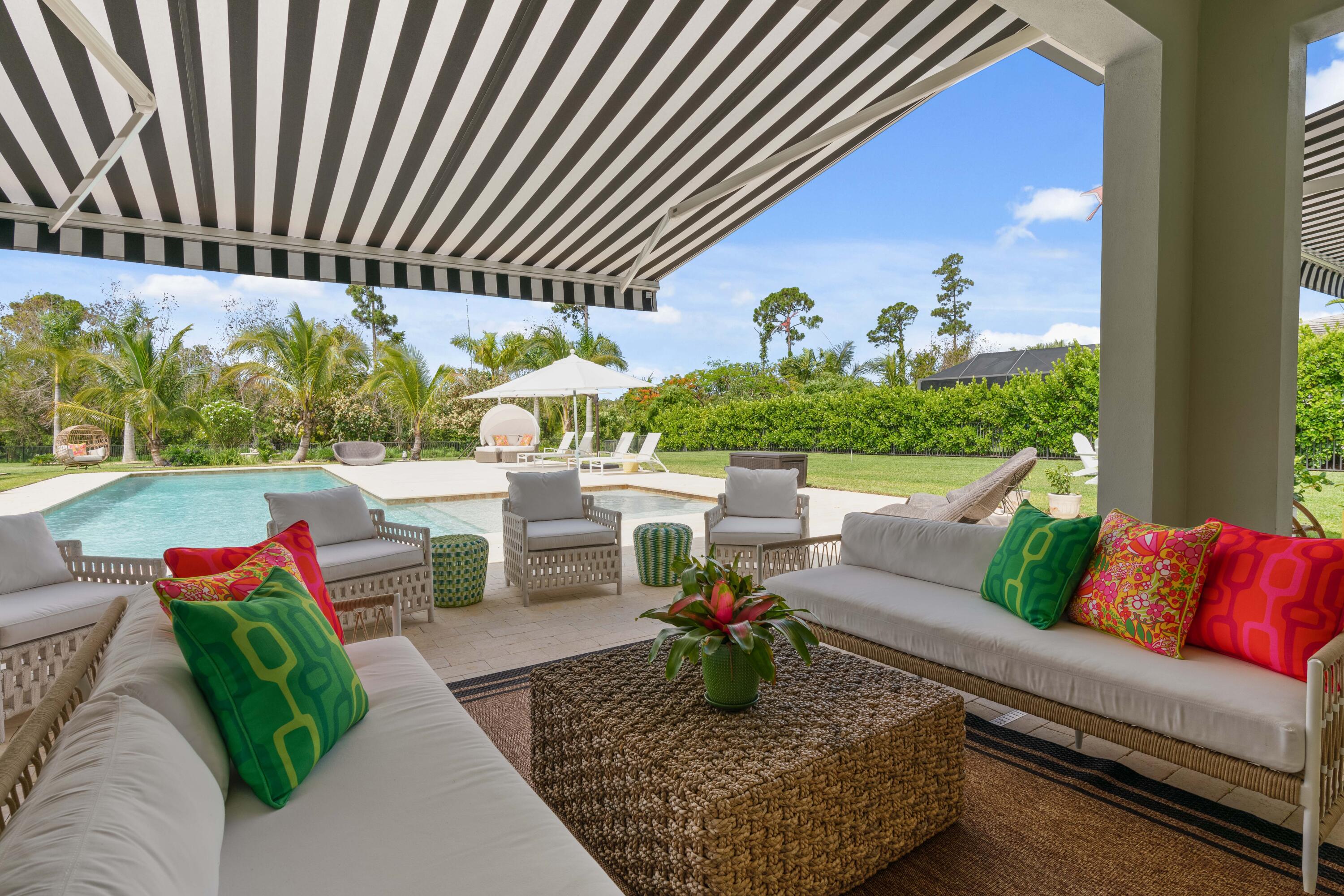 8208 Southeast Red Root Way Jupiter, FL 33458 - Photo 70 of 113 Loggia with Awning