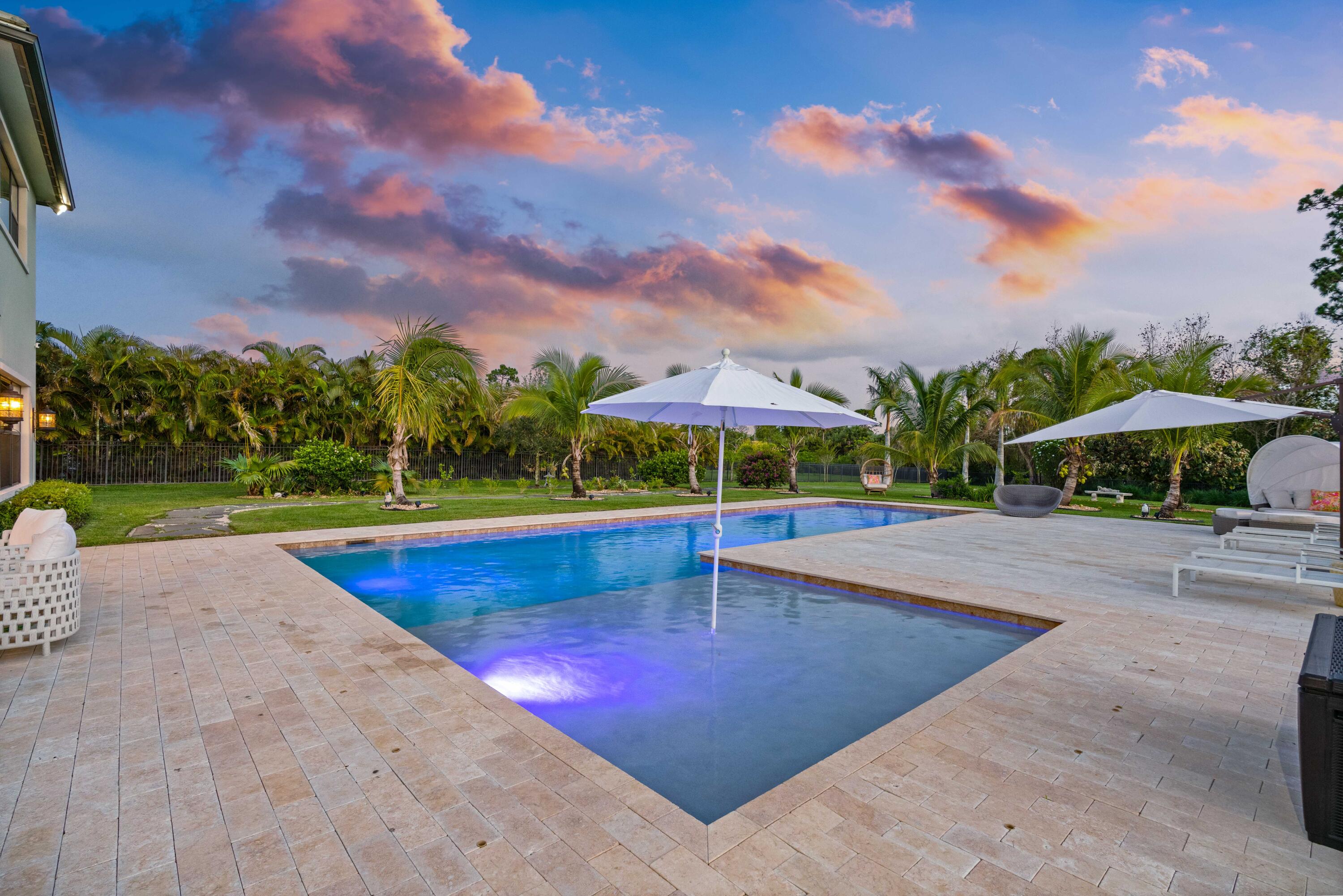 8208 Southeast Red Root Way Jupiter, FL 33458 - Photo 82 of 113 Twilight Pool
