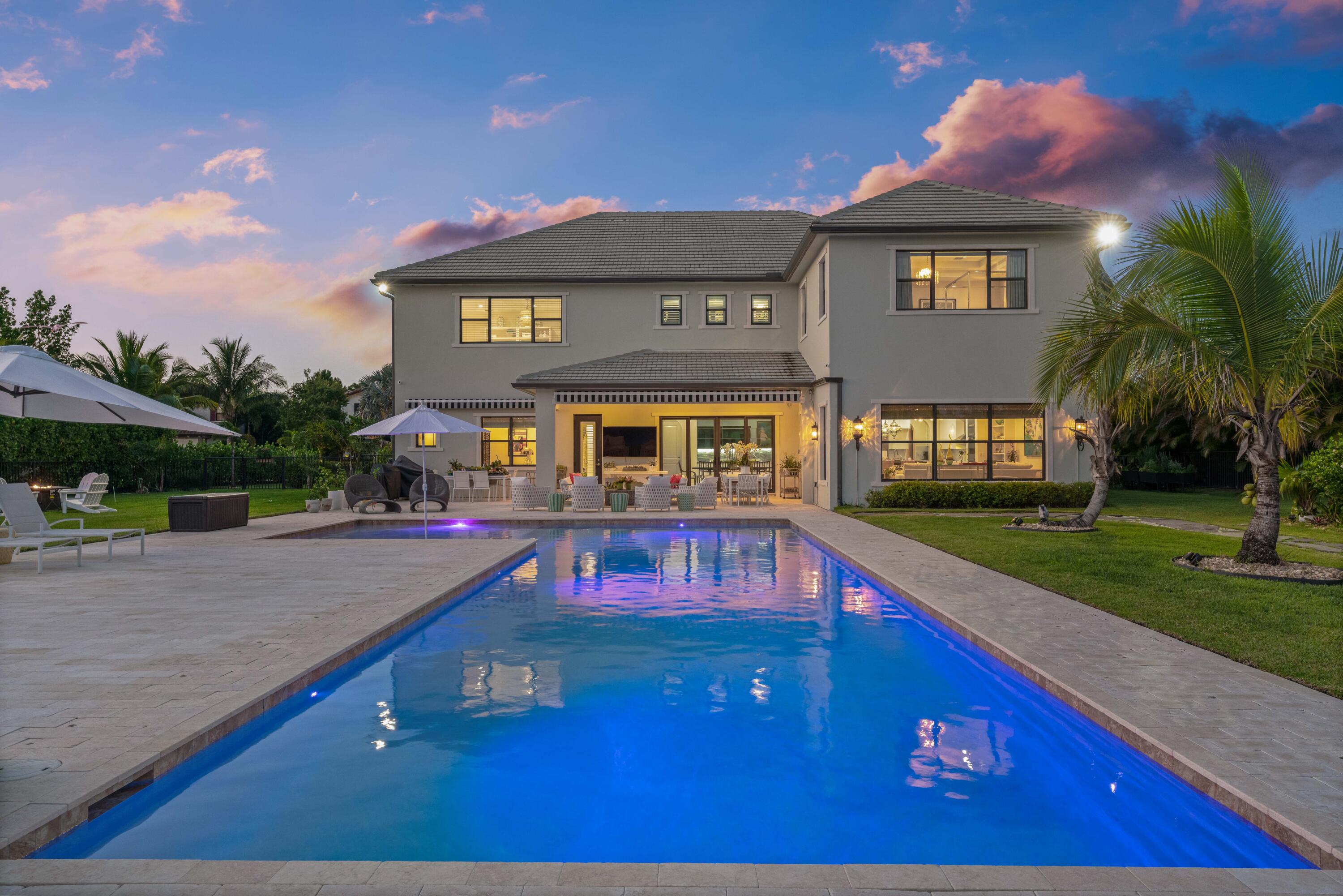 8208 Southeast Red Root Way Jupiter, FL 33458 - Photo 85 of 113 Twilight Back Exterior