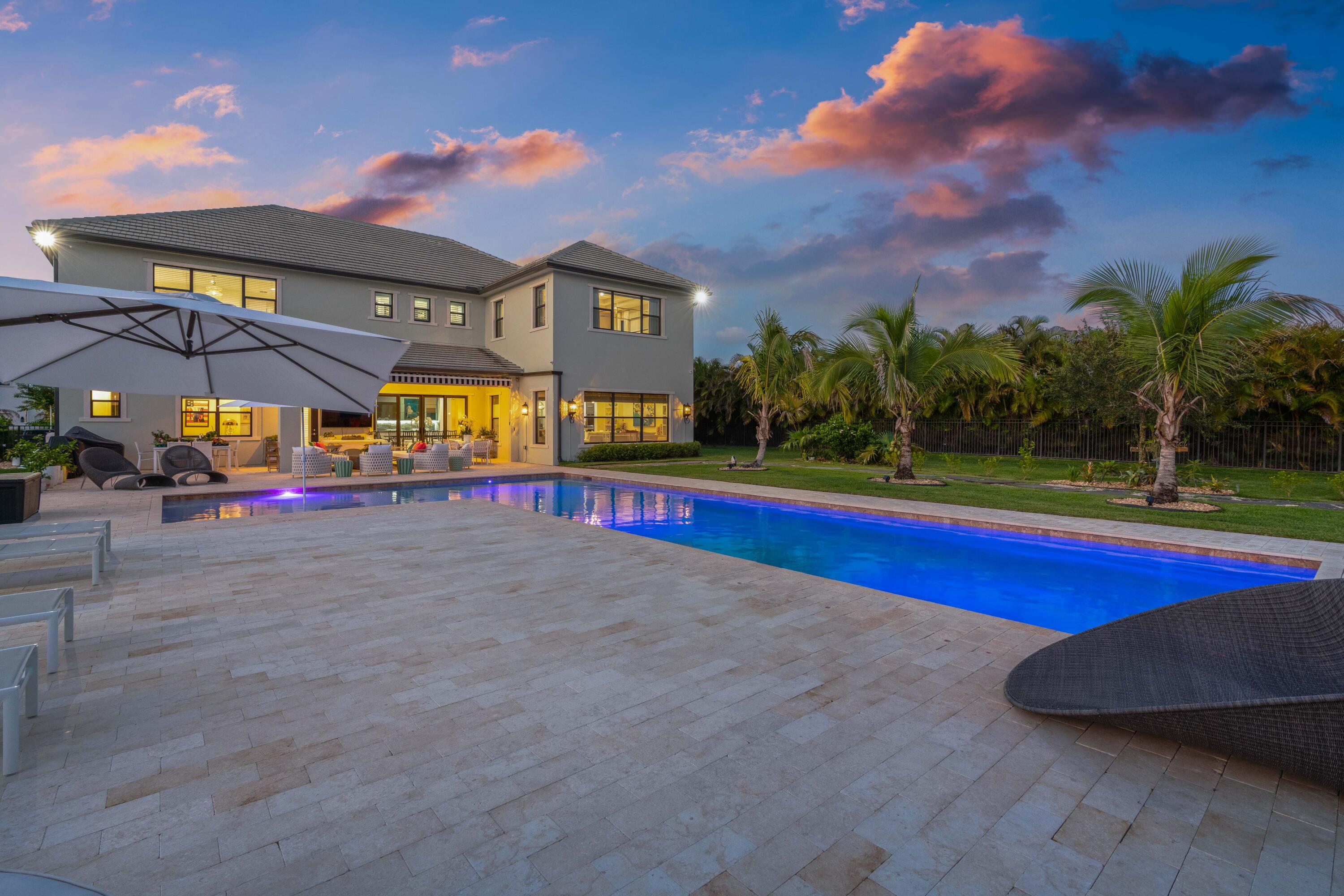 8208 Southeast Red Root Way Jupiter, FL 33458 - Photo 87 of 113 Twilight Back Exterior