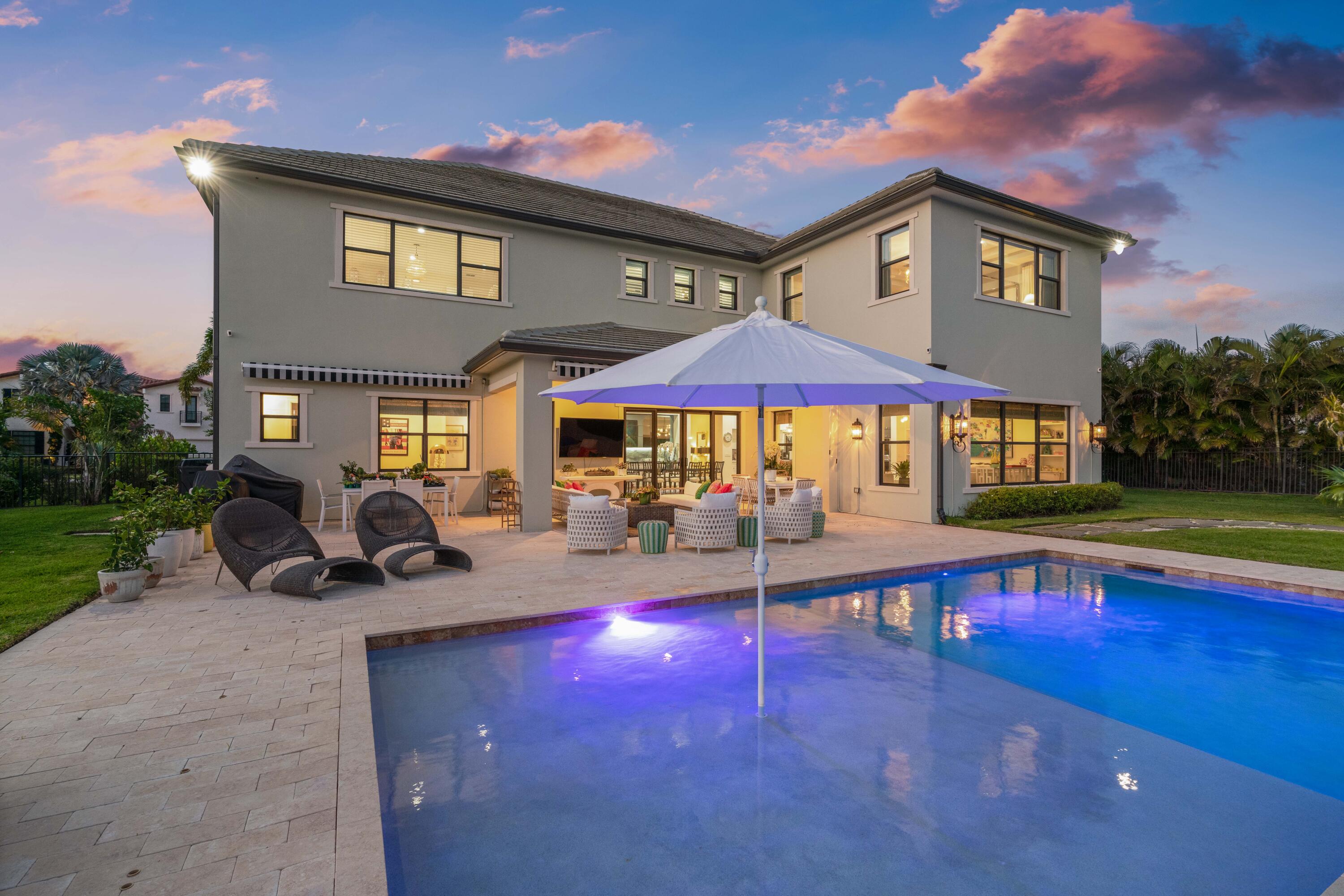 8208 Southeast Red Root Way Jupiter, FL 33458 - Photo 88 of 113 Twilight Back Exterior