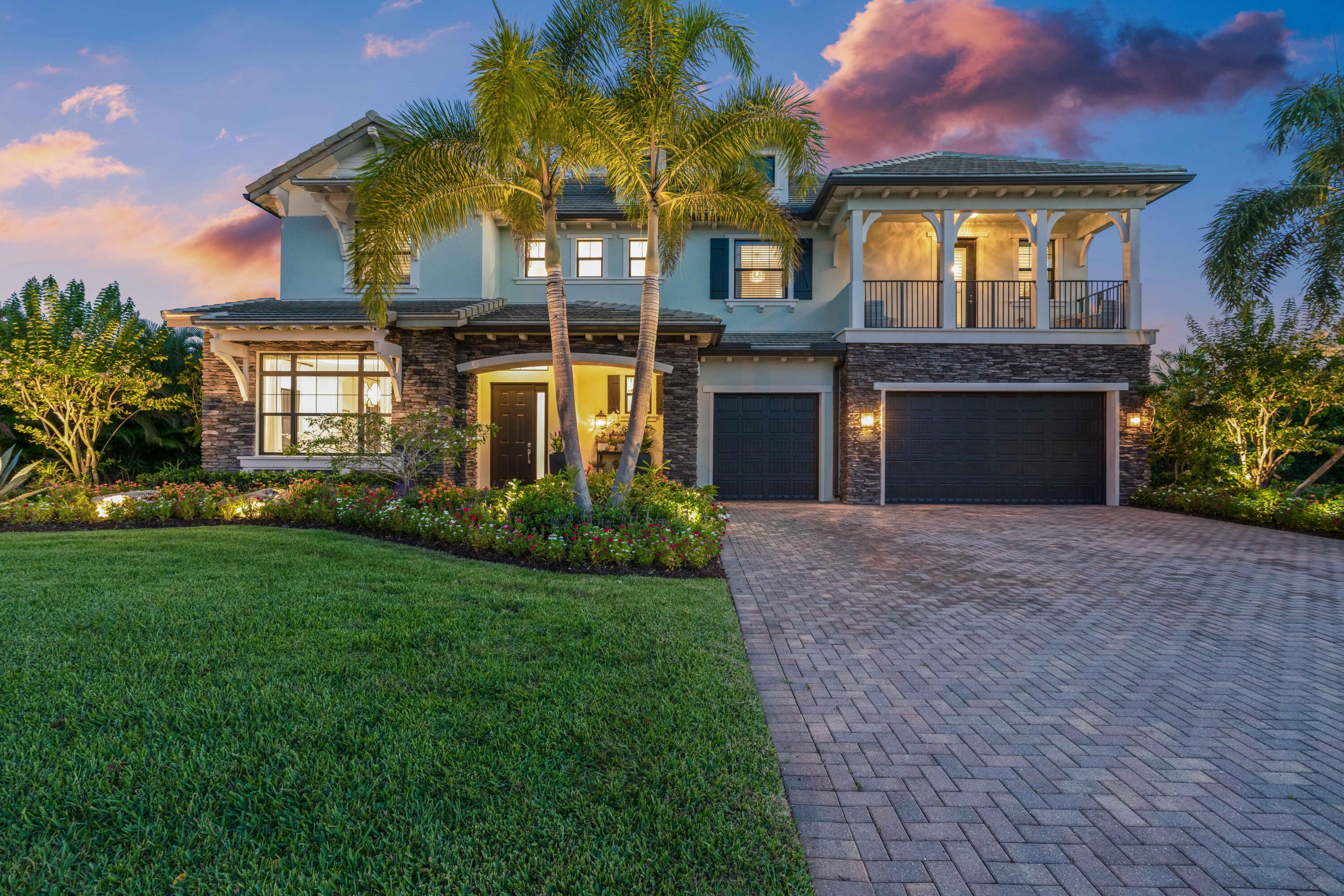 8208 Southeast Red Root Way Jupiter, FL 33458 - Photo 89 of 113 Twilight Front Exterior