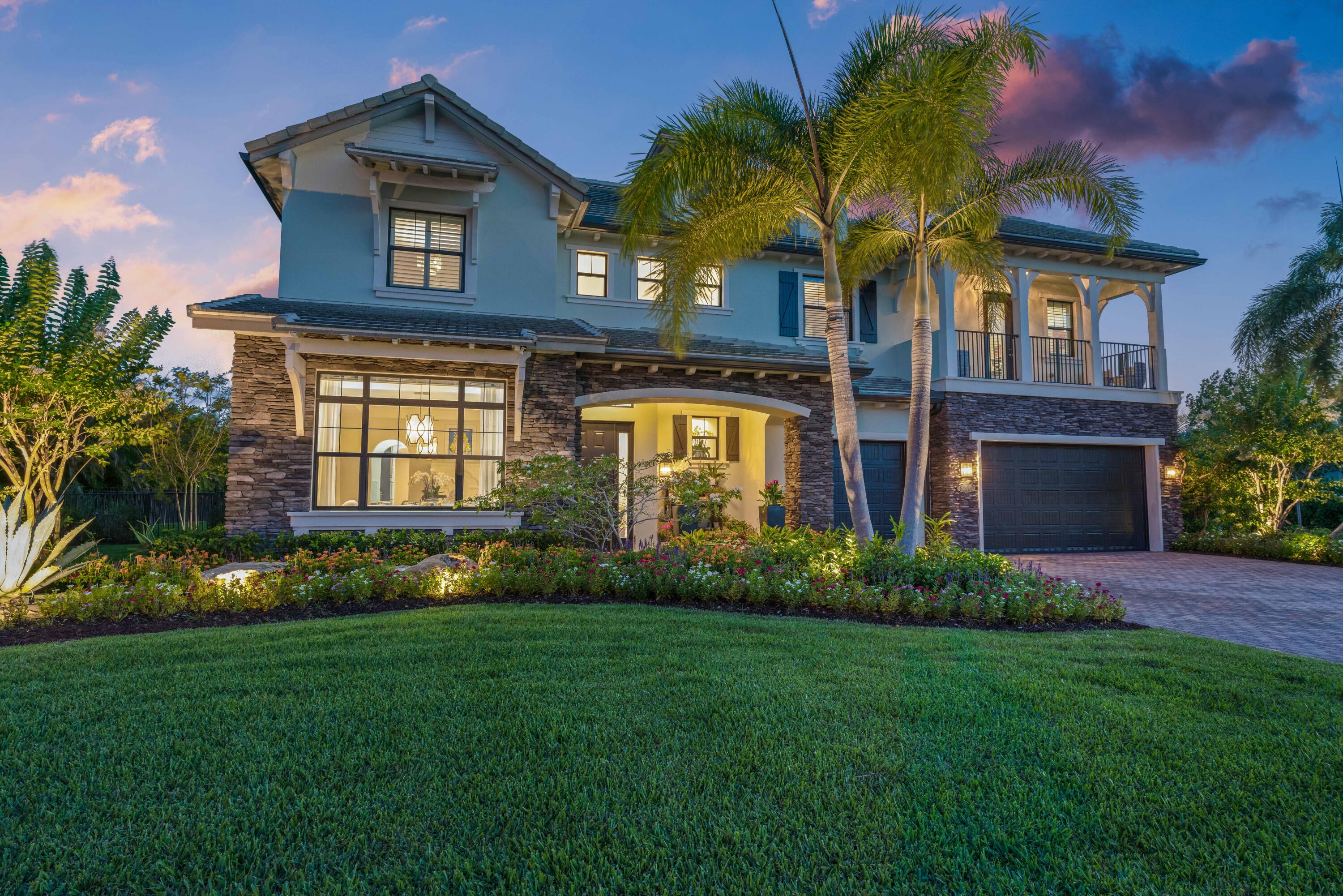 8208 Southeast Red Root Way Jupiter, FL 33458 - Photo 92 of 113 Twilight Front Exterior